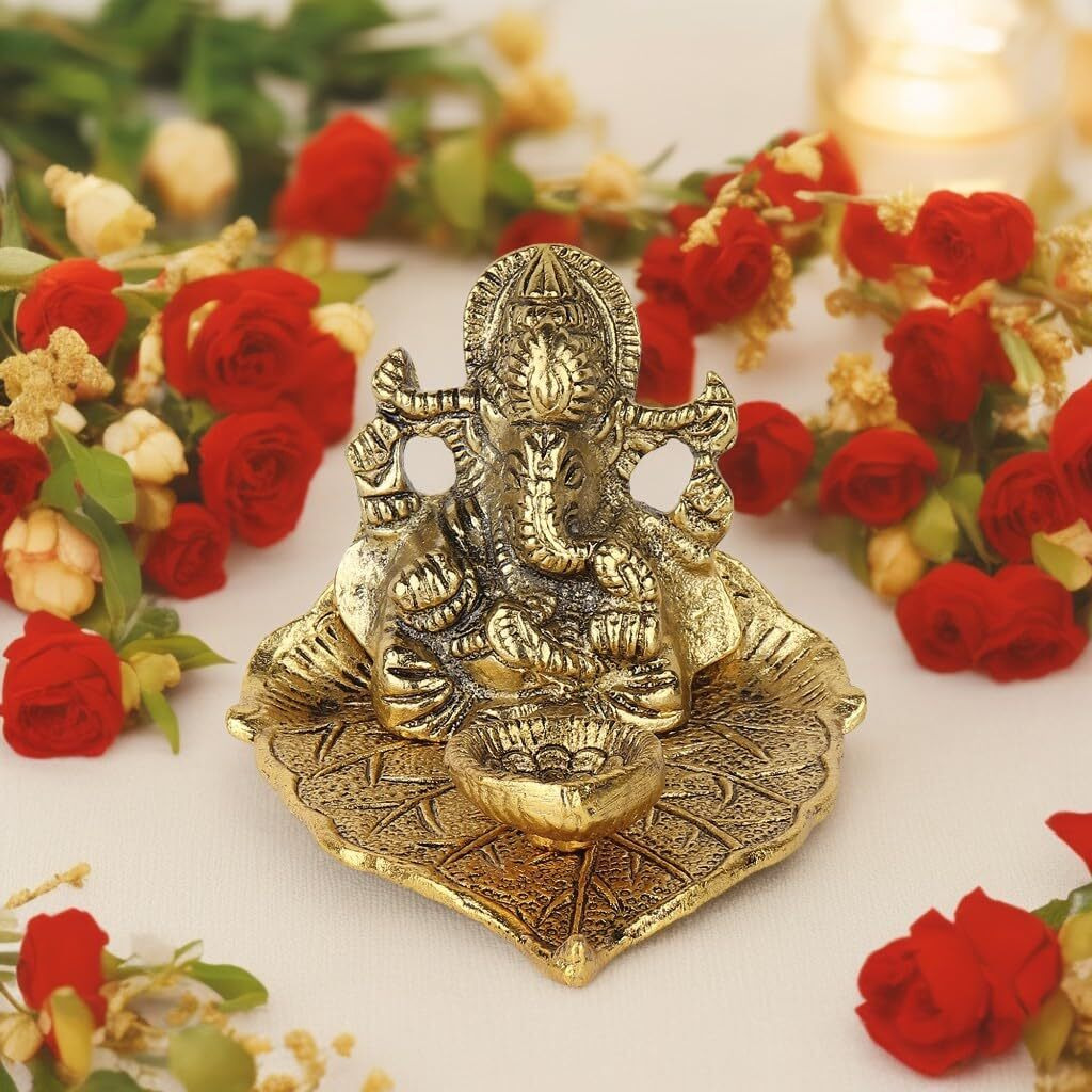 karigar creations Metal Lord Ganesha Idol on Leaf with Diya for Puja Diwali Decoration Items Home Decorative Gift Puja 10x11 cm