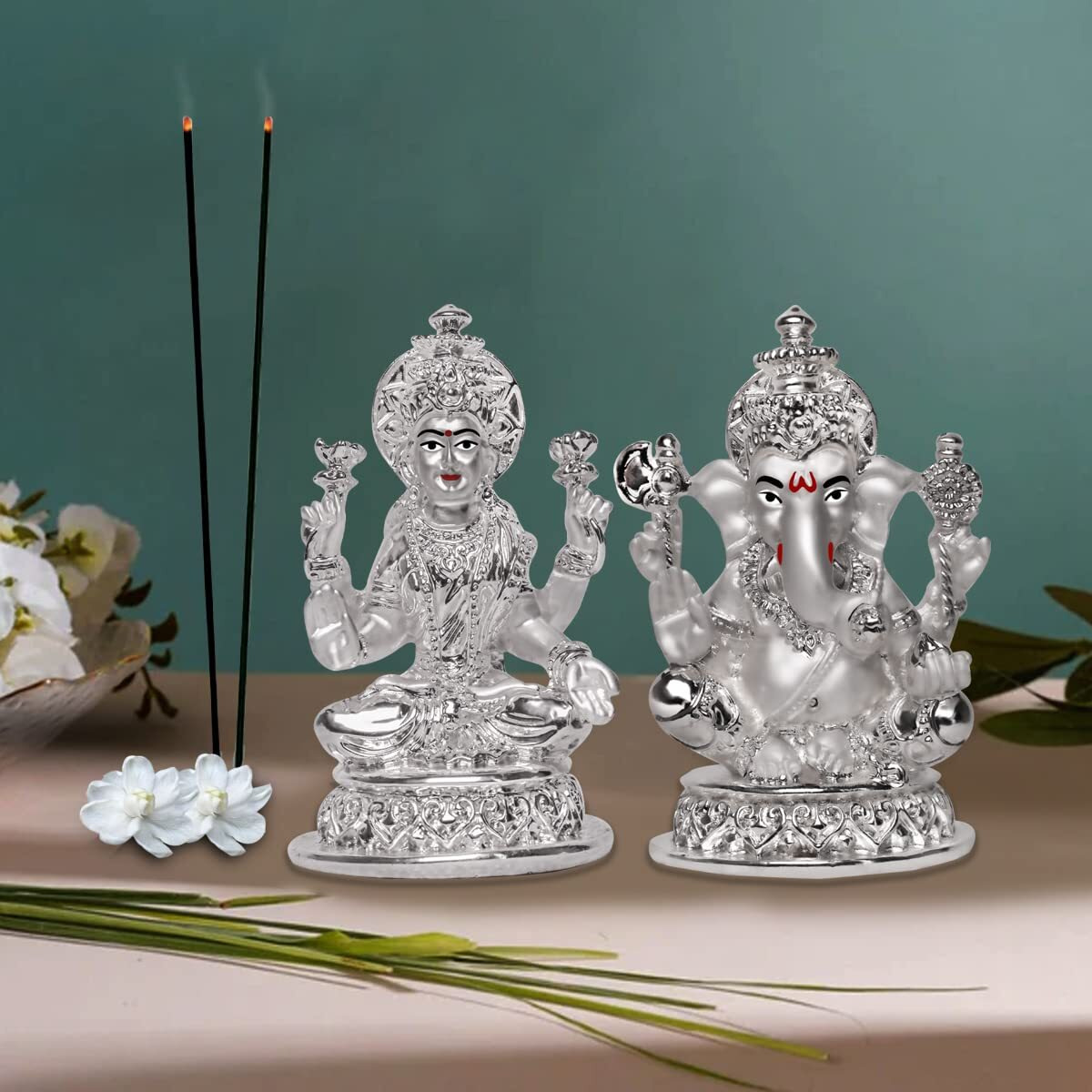 DIVINITI Laxmi & Ganesha Idol for Home Decor 999 Silver Plated Sculpture of laxmi, Ganpati Figurine Idol for Home, Office, Temple and Table Decoration Religious Idol for Pooja, Gift (5.7 CM X 7 CM)