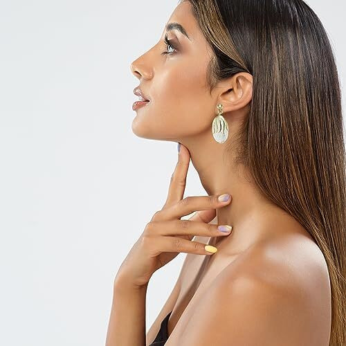 Estele Gold & Rhodium Dual Tone Abstract Textured Earring for Women