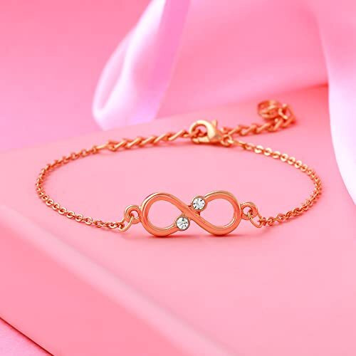 Estele Alloy with Crystal Infinity Link Bracelet for Girls (Gold)