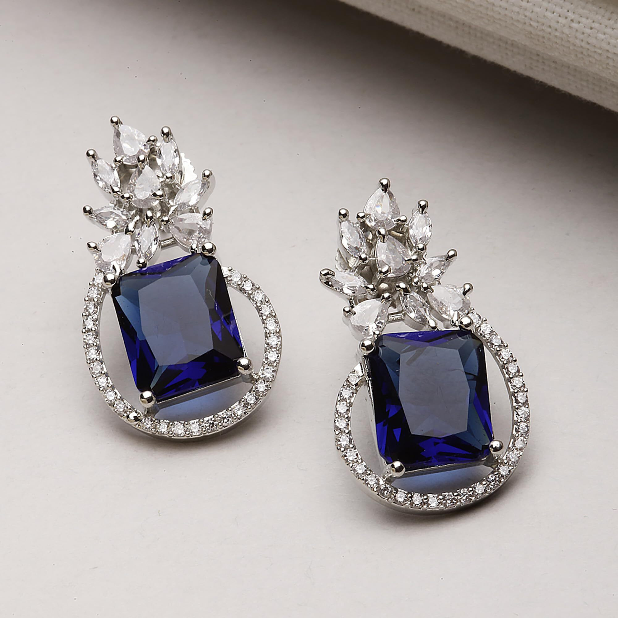 ZENEME Rhodium-Plated American Diamond studded Paisley Shaped Studs Earrings For Women & Girls