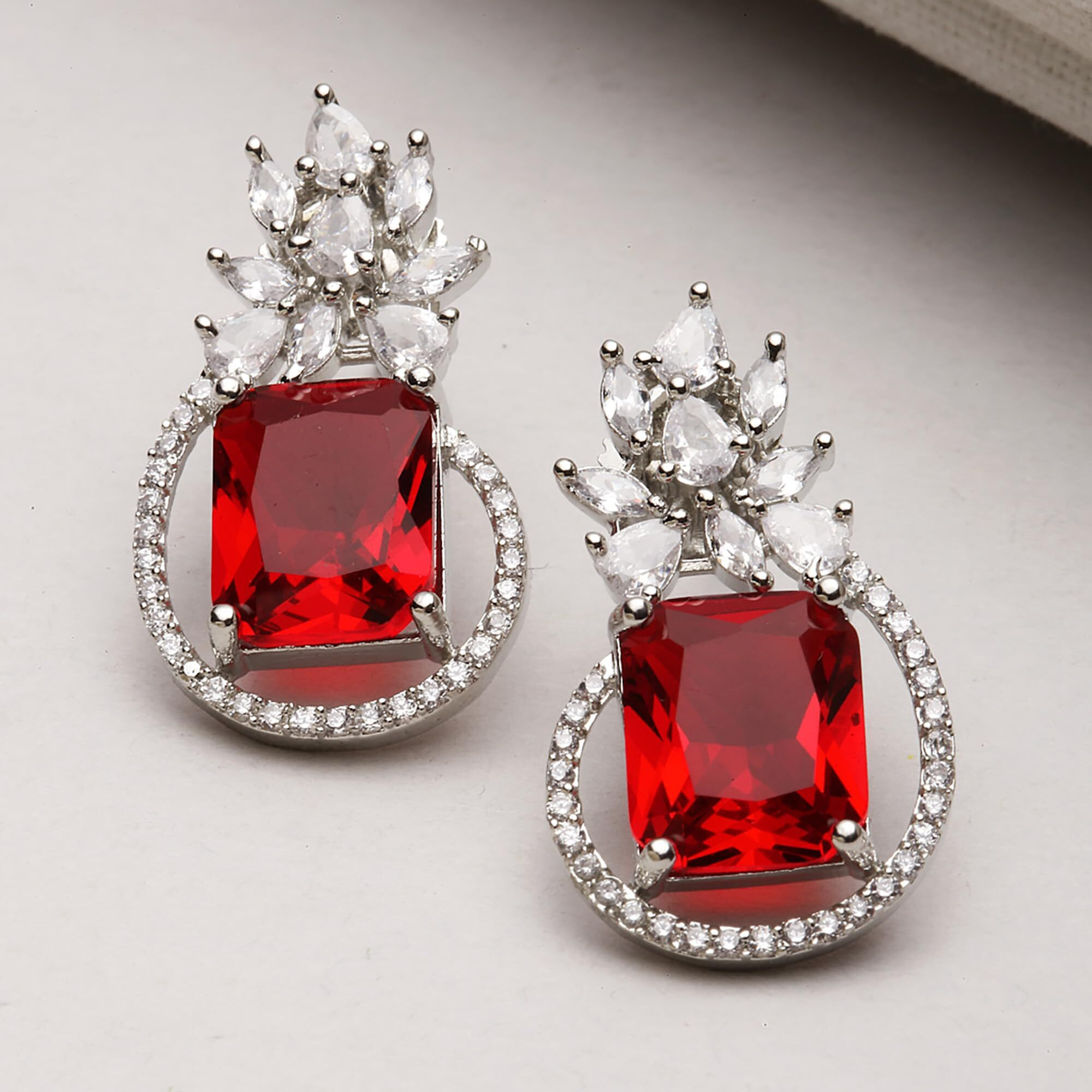 ZENEME Rhodium-Plated American Diamond studded Paisley Shaped Studs Earrings For Women & Girls