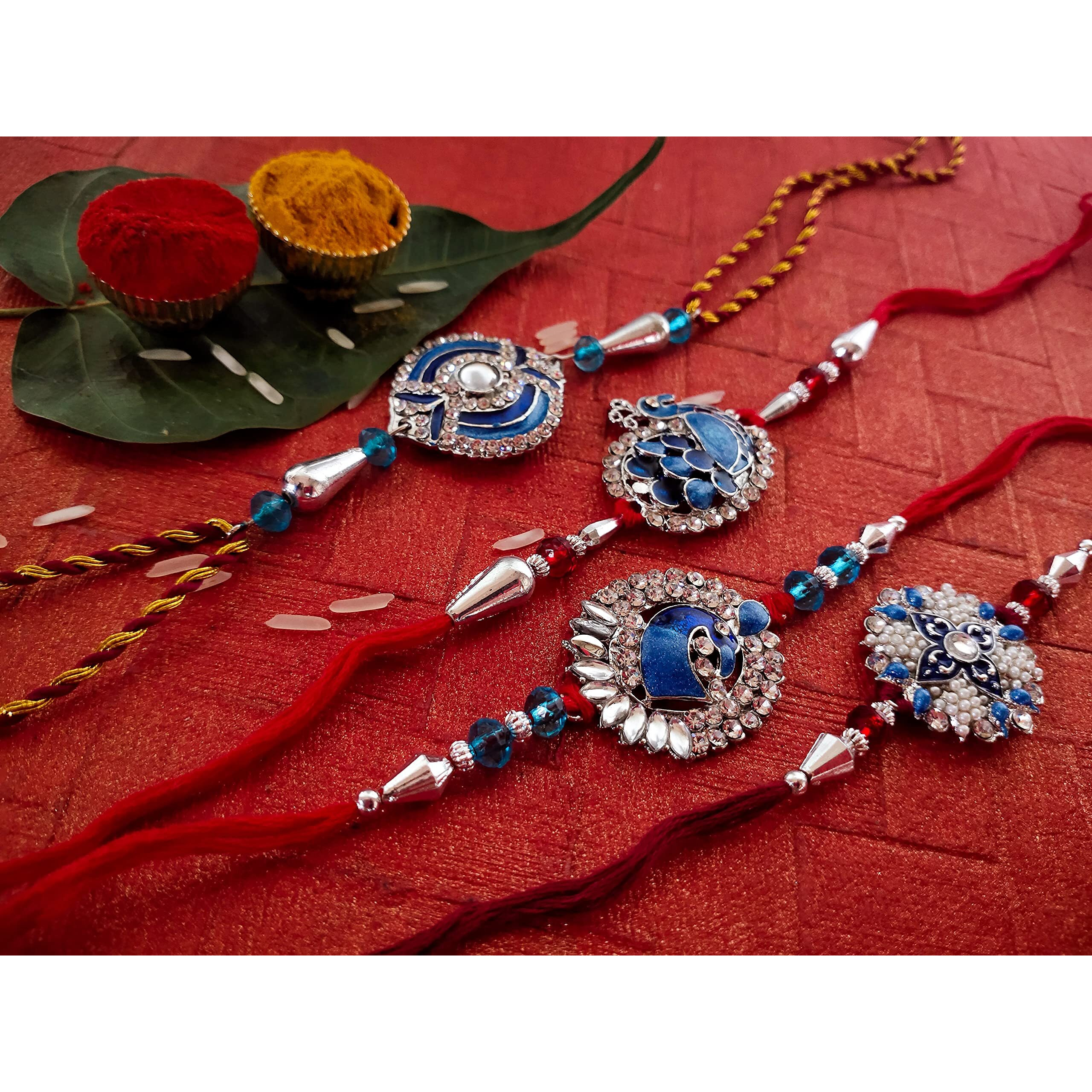 Mahi Combo of Four Meenakari Work Rakhis with Artificial Pearl and Crystal for Brothers (CO1104285RC)