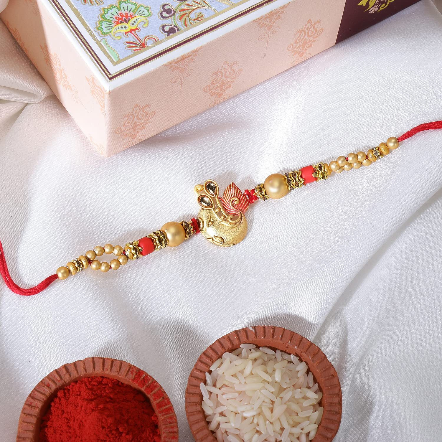 Riddhika Ventures Glorious Gold Plated Om and Diamond Ring Rakhi (Bracelet) with Roli Chawal and Greeting Card (K5)