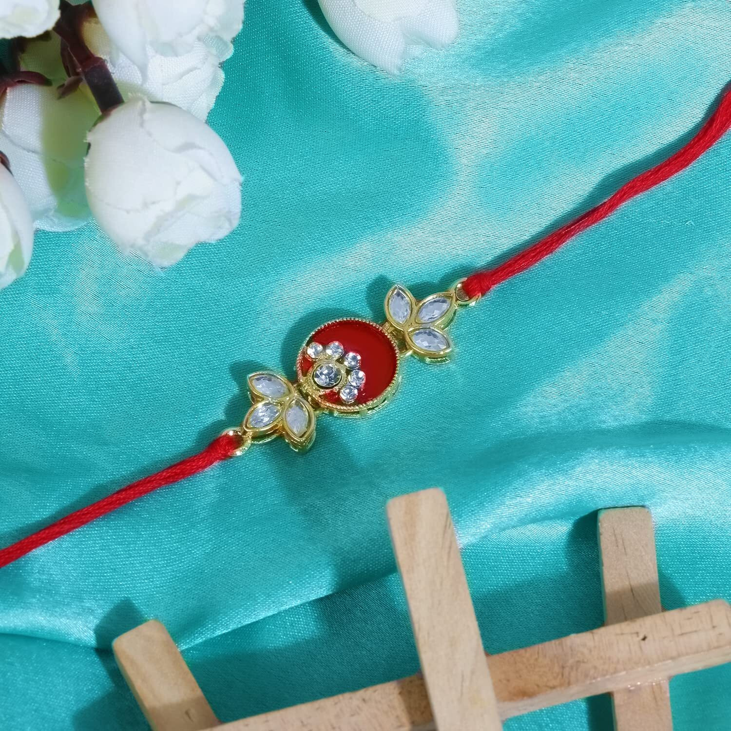 Riddhika Ventures Alluring Gold Plated Floral and Pearl Rakhi (Bracelet) with Roli Chawal & Greeting Card for Men (P8)