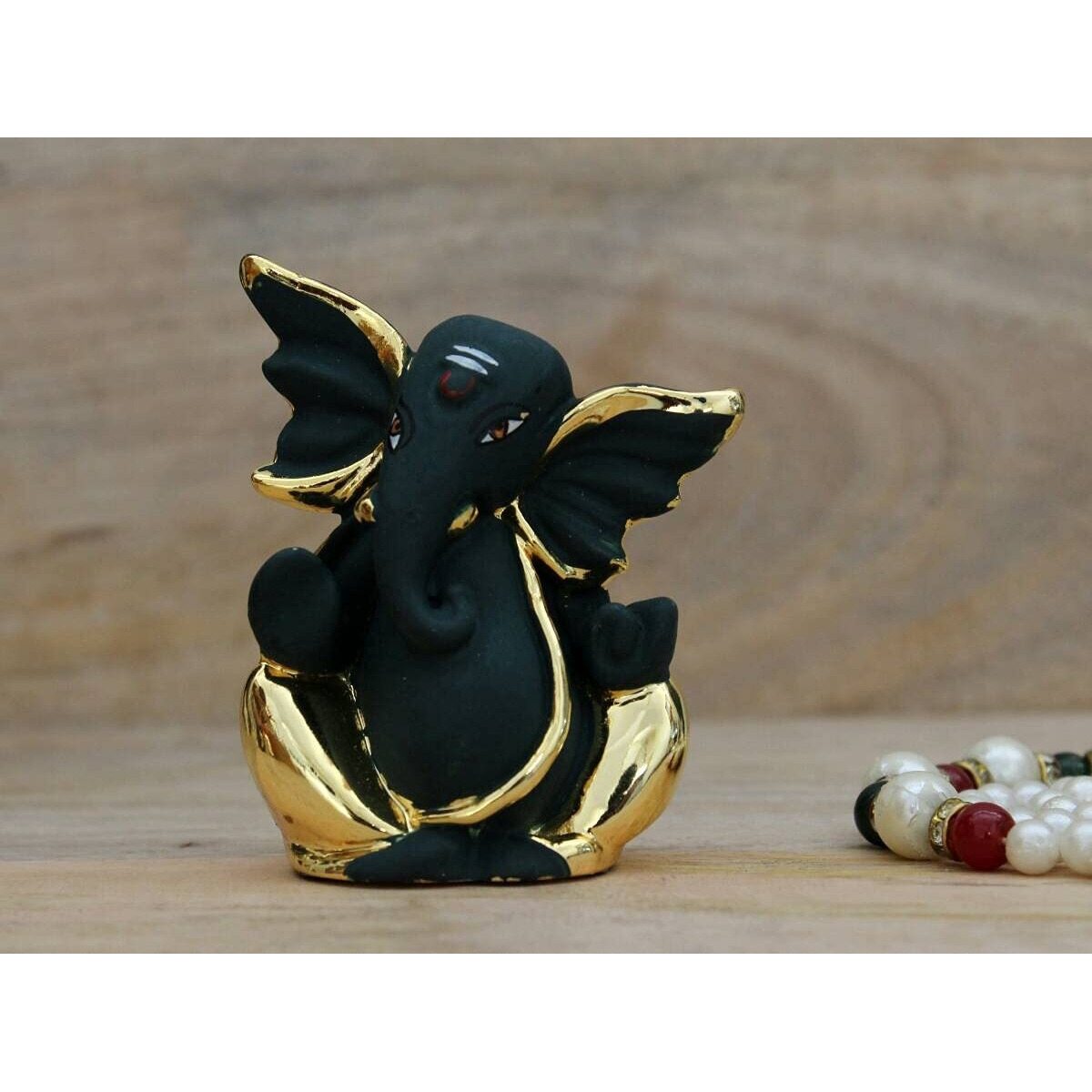 Shri Handicrafts God Ganpati Gold Plated Ganesha Idol for Car Dashoboard & Home Dcor(4x3x8cm, Black), Resin