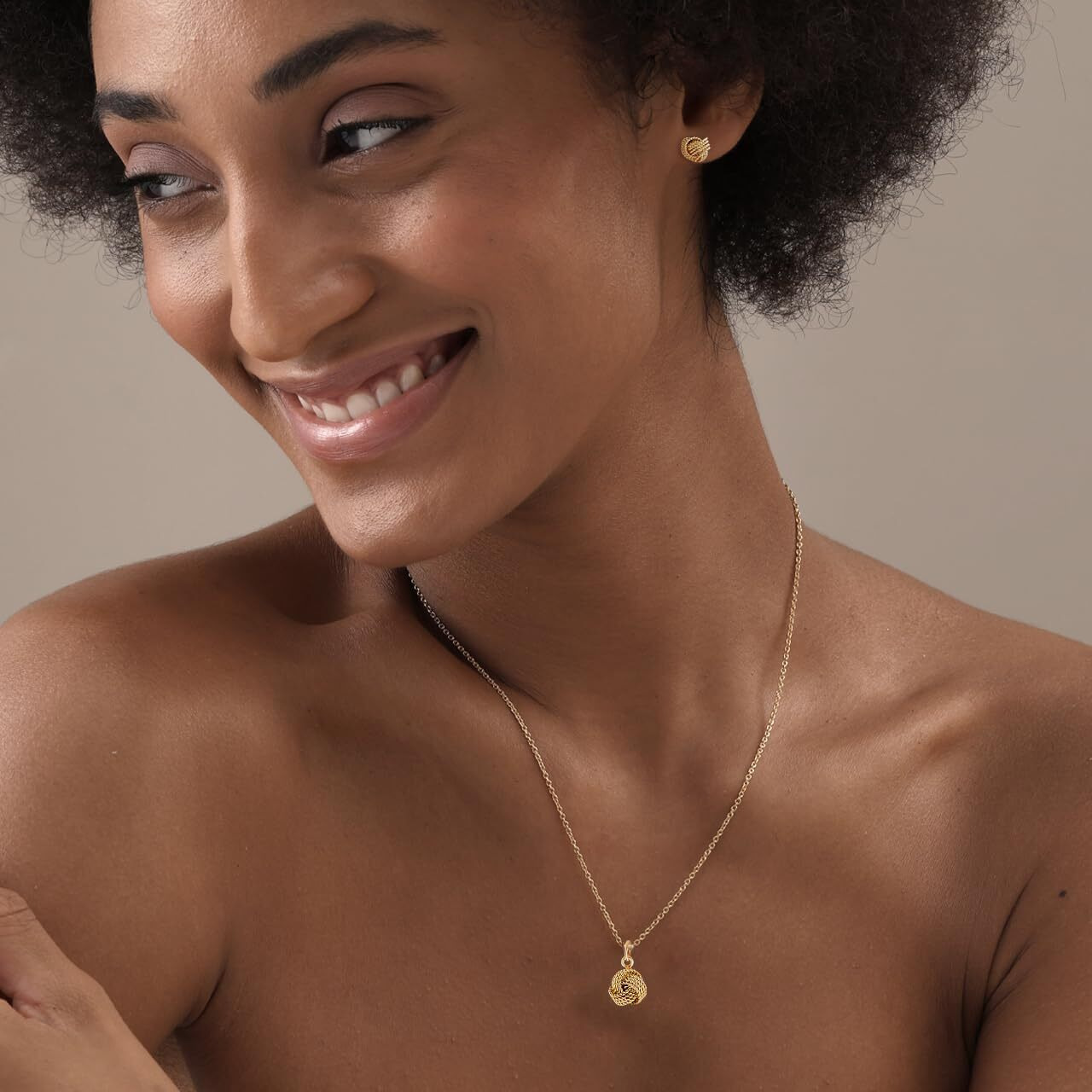 Amazon Brand - Nora Nico 925 Sterling Silver BIS Hallmarked Light-Weight Love Knot Gold Plated Stud Earring and Pendant Necklace Set for Women and Girls
