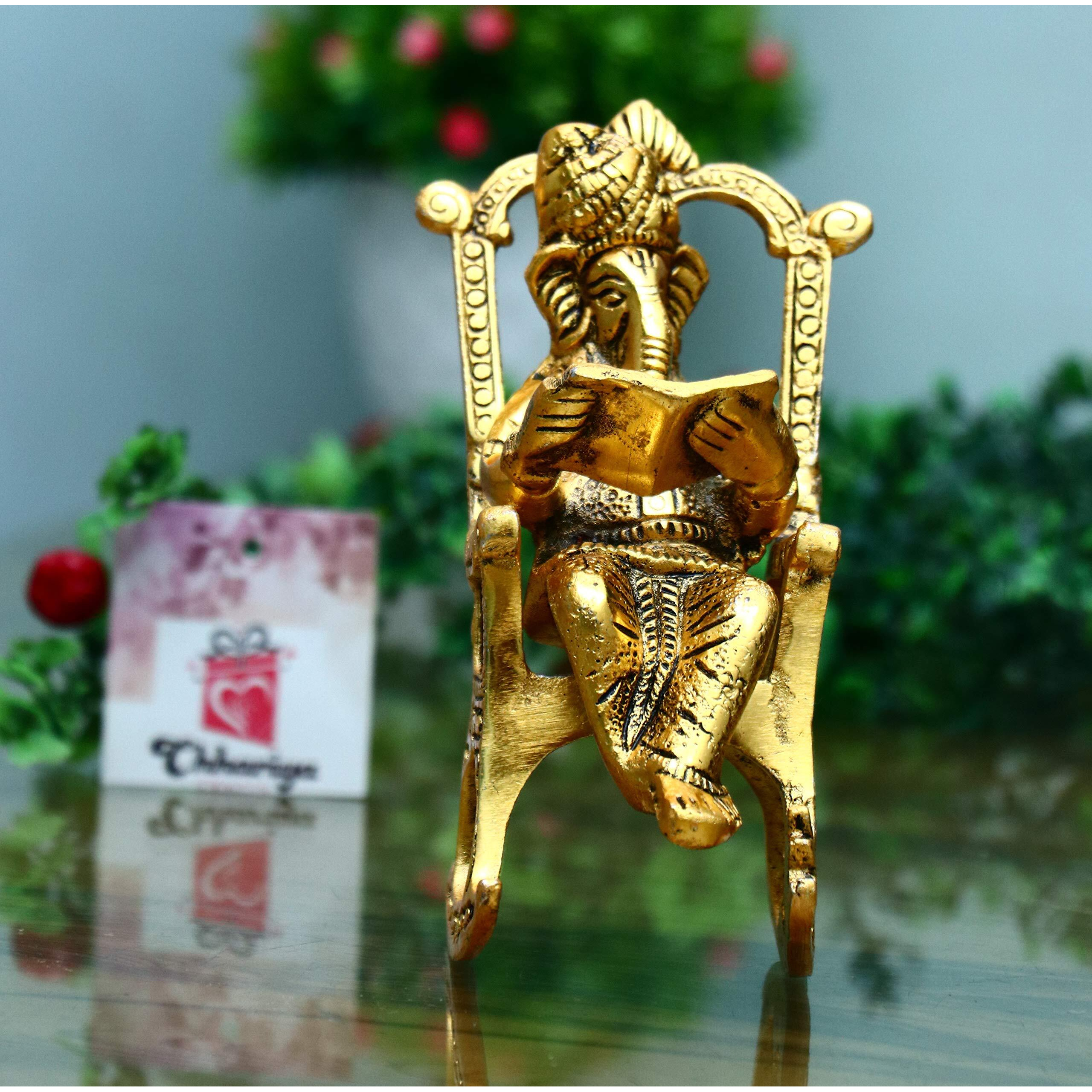 CHHARIYA CRAFTS Metal Lord Ganesh Reading Ramayana Statue Ganpati Sitting on Chair with Kuber Diya Idol for Home Office and Gifts Decor Corporate Gifts Decorative Showpiece - 14 cm (Metal, Gold)