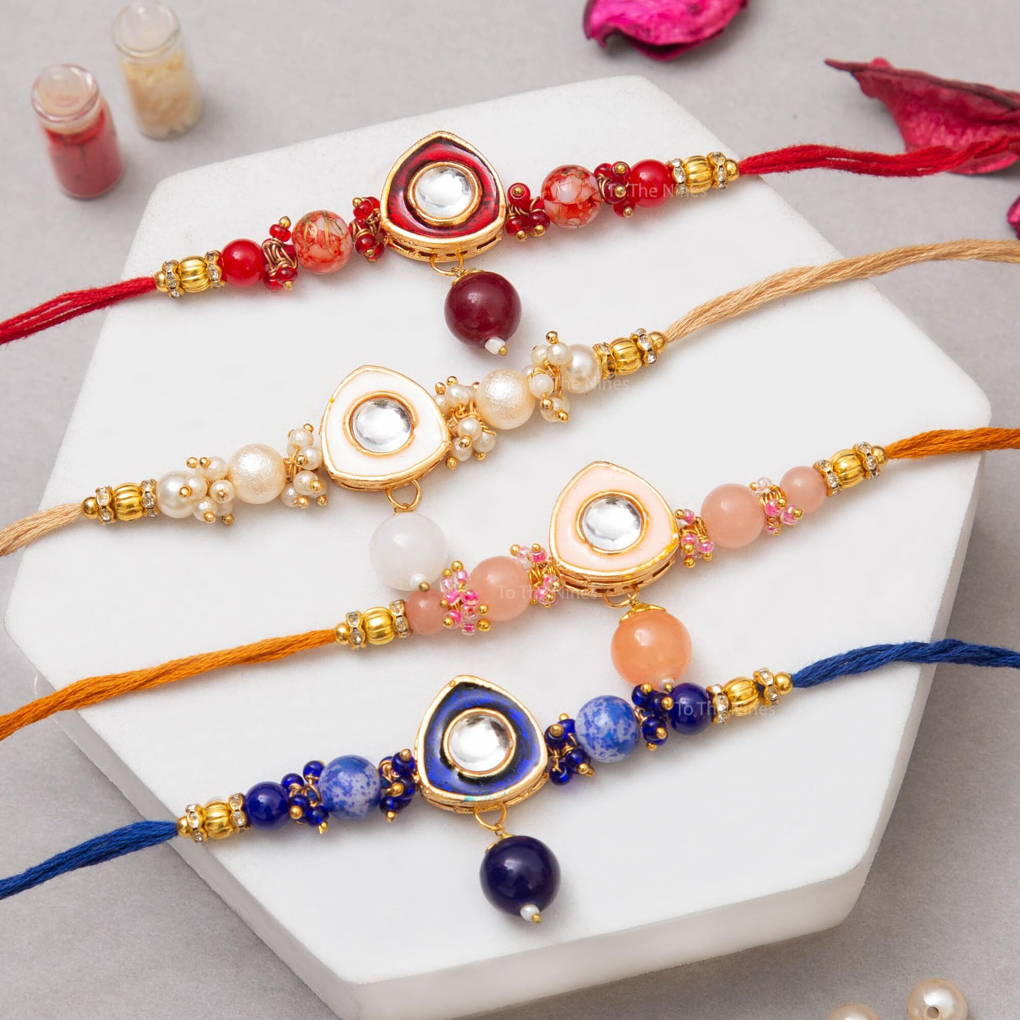 To The Nines Elegant Rakhi Bracelet for Beloved Brother with Tilak Material - Golden - Combo of 4 For Men