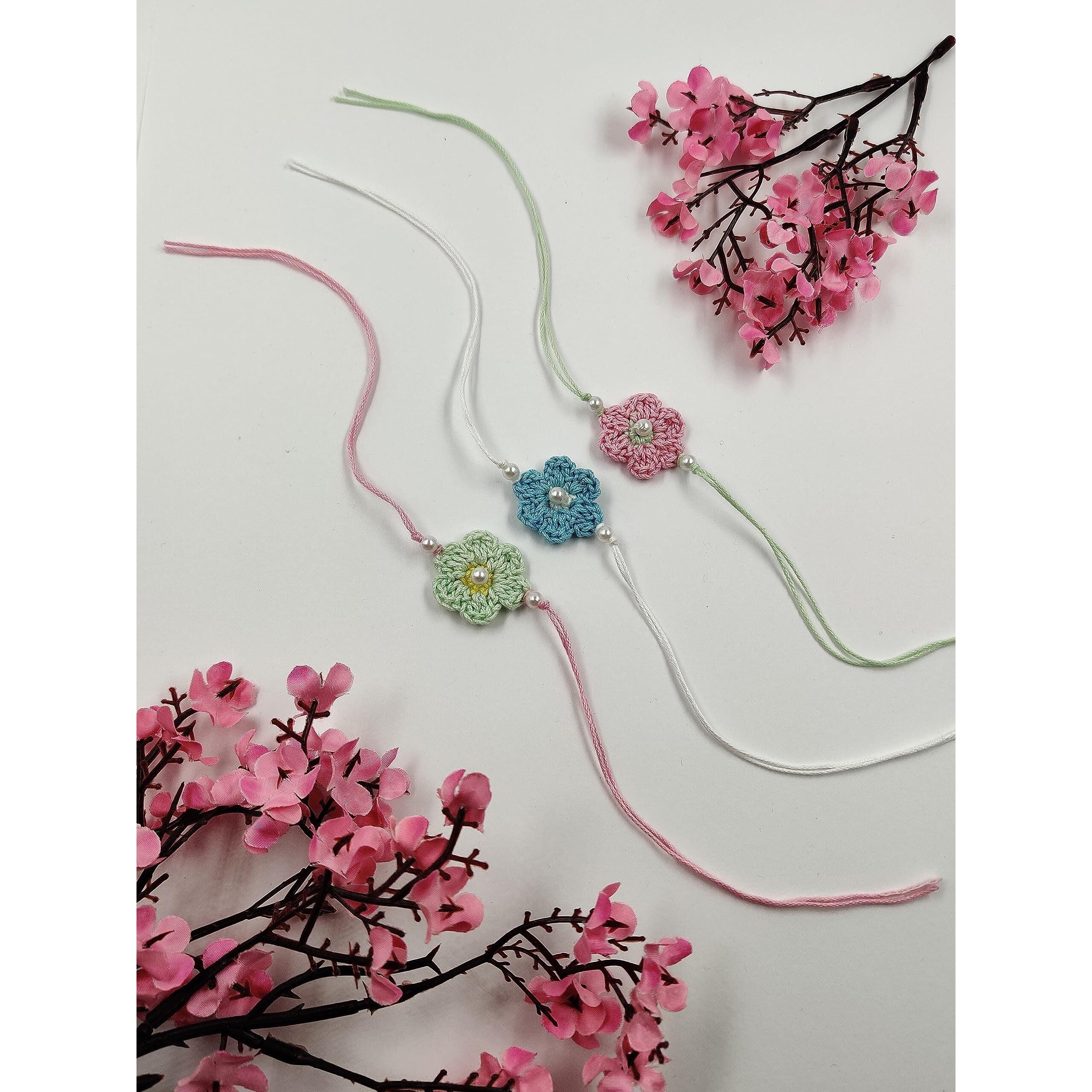 Prapti Handicrafts Handmade Eco Friendly Crochet Set of 3 Rakhis Family Combo Rakhi for Brother Bhabhi Bhaiya Bhai Rakhdi for Brother (Pastel Crochet Rakhi-Pack of 3)