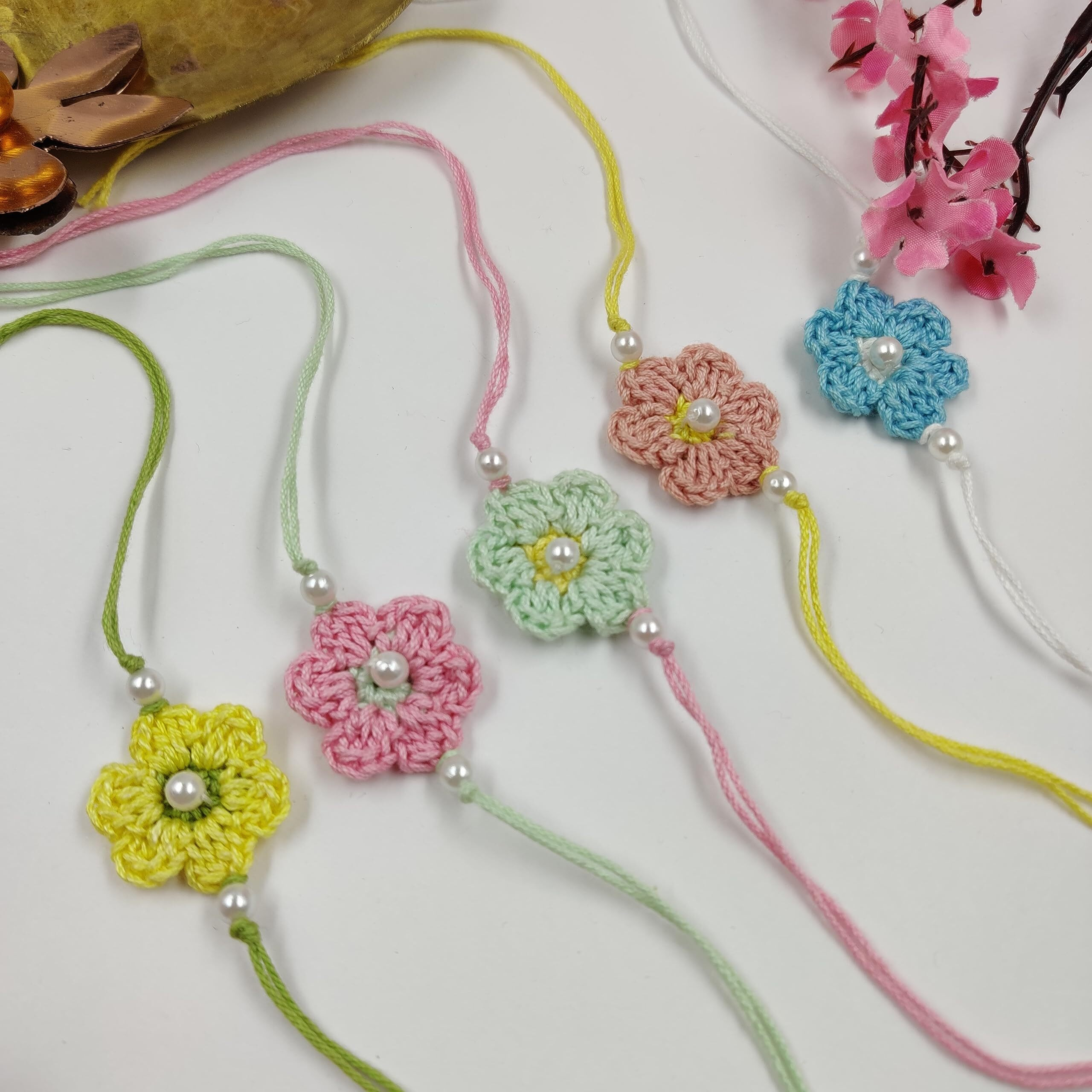 Prapti Handicrafts Handmade Eco Friendly Crochet Set of 5 Rakhis Family Combo Rakhi for Brother Bhabhi Bhaiya Bhai Rakhdi for Brother (Pastel Crochet Rakhi-Pack of 5)
