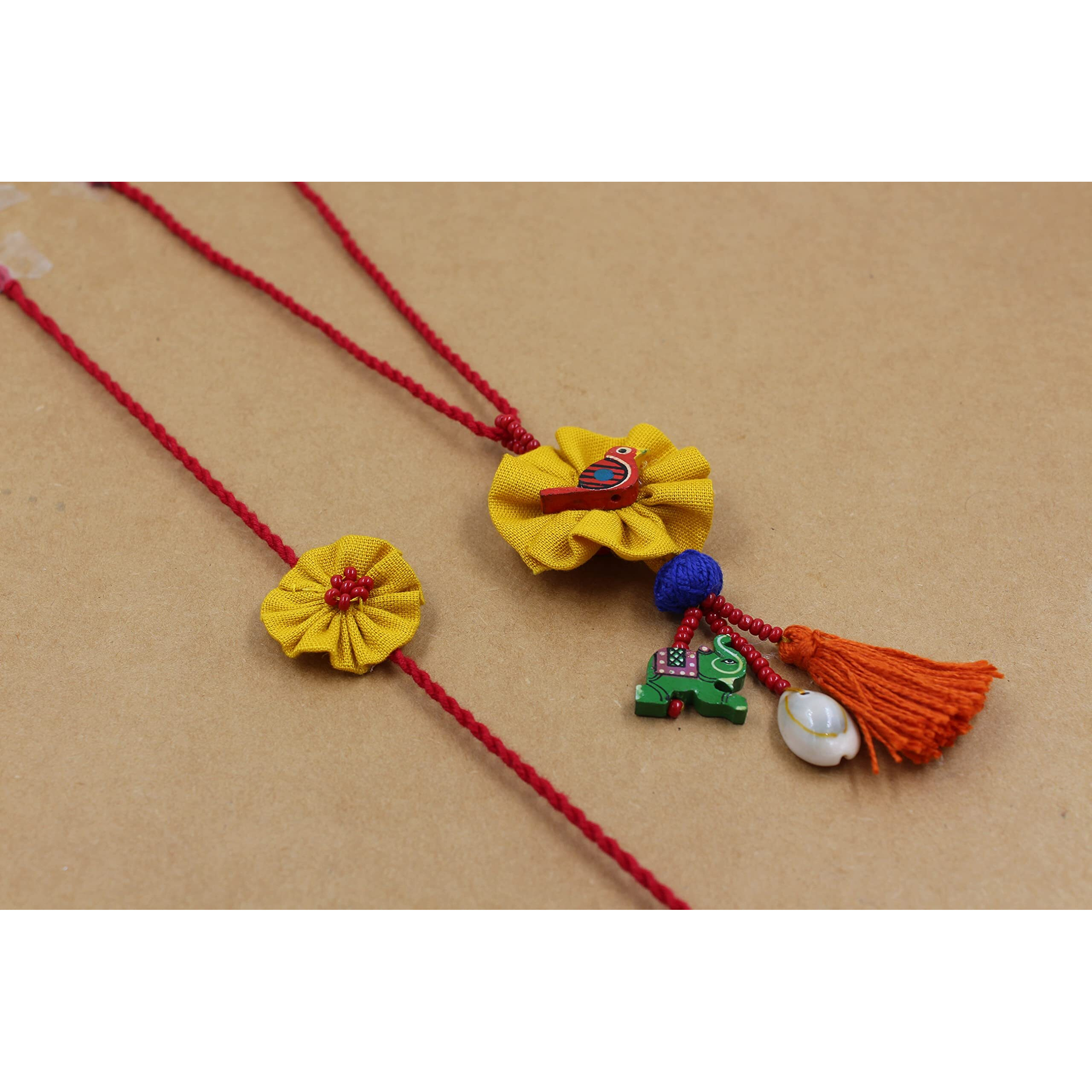 Prapti Handicrafts embroidery flower Rakhi reuasble combo with gift potli bag And roli chawal (Pack of 4)