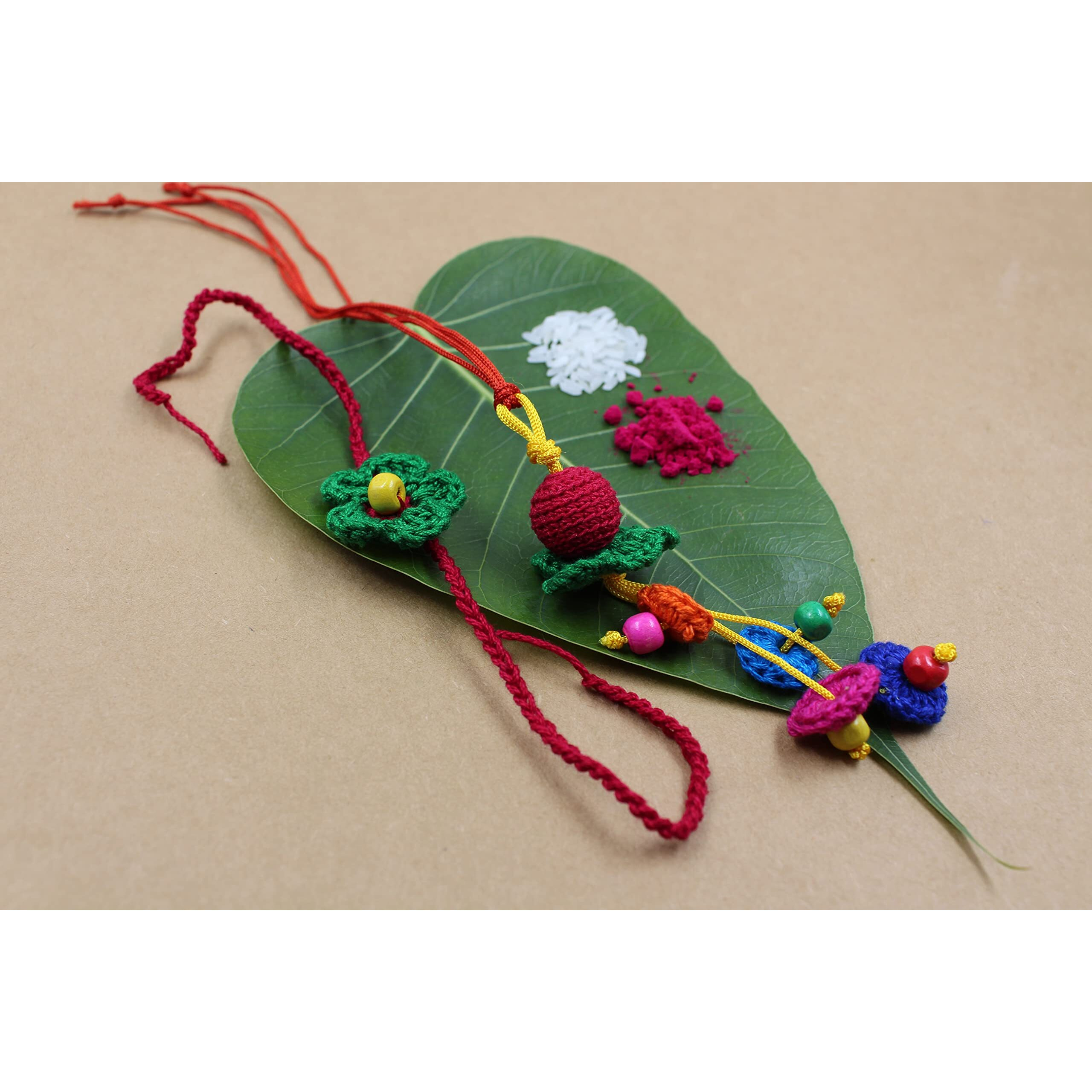 Prapti Handicrafts Handmade Embroidery Crochet Rakhi for Bhai/Bhabhi with Roli Chawal (pack of 3)