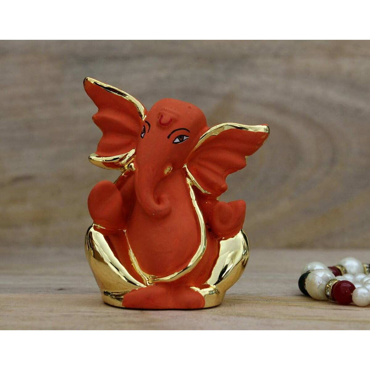 INDICAST Resin God Ganpati Gold Plated Ganesha Idol for Car Dashoboard & Home and Office Dcor - (4x3x8cm, Orange)