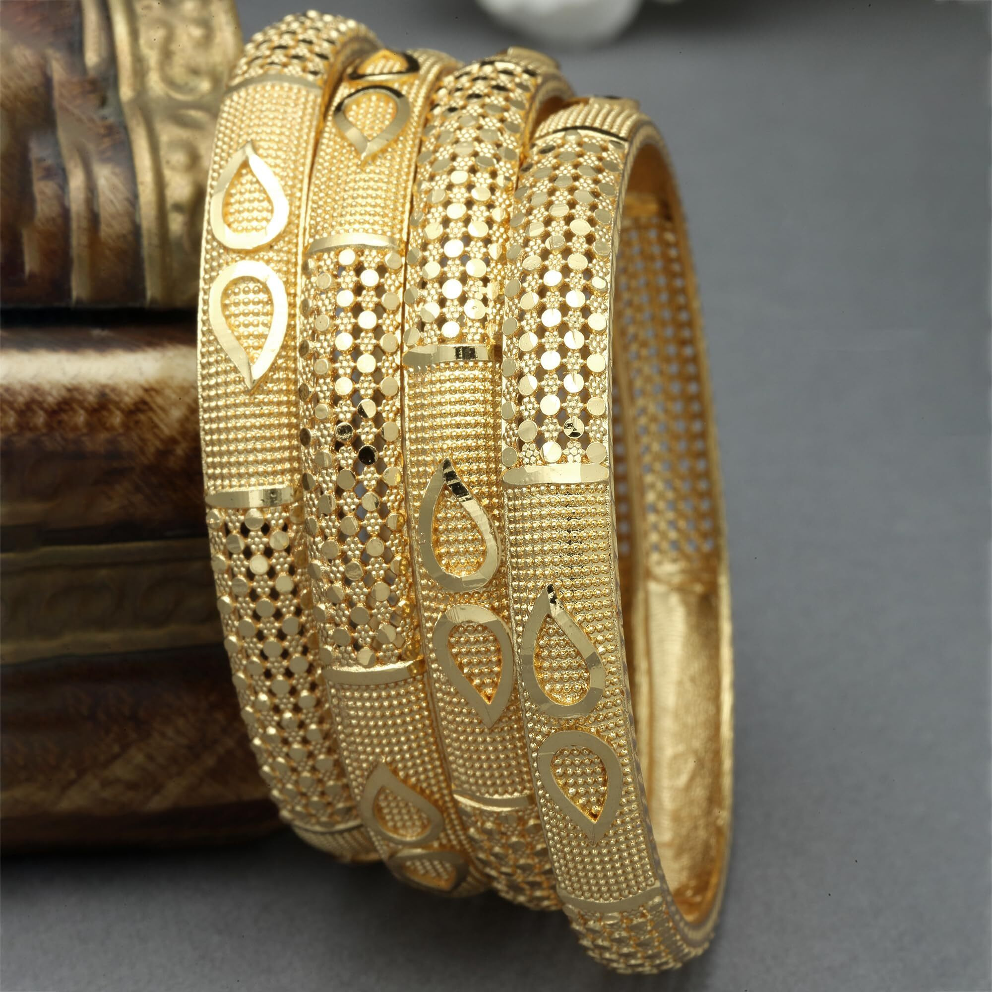 ZENEME Set Of 4 Gold-Plated Classic Paisley Shaped Textured Handcrafted Bangles (2.8)