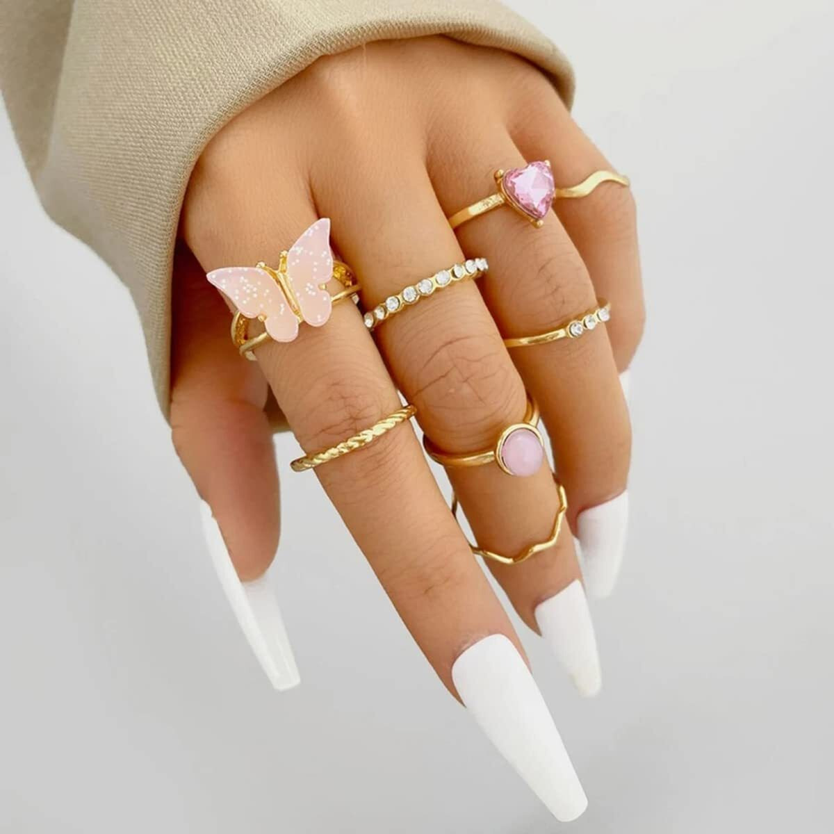 Jewels Galaxy Jewellery For Women Gold Plated Pink Stone Studded Butterfly Stackable Rings Set of 8 (JG-PC-RNGH-986)