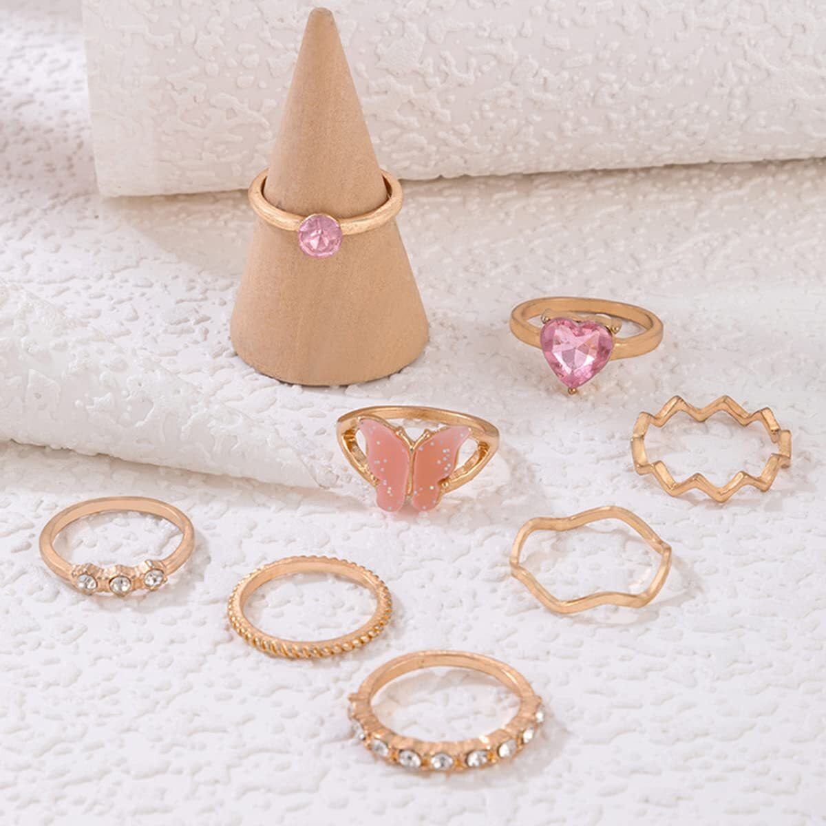 Jewels Galaxy Jewellery For Women Gold Plated Pink Stone Studded Butterfly Stackable Rings Set of 8 (JG-PC-RNGH-986)