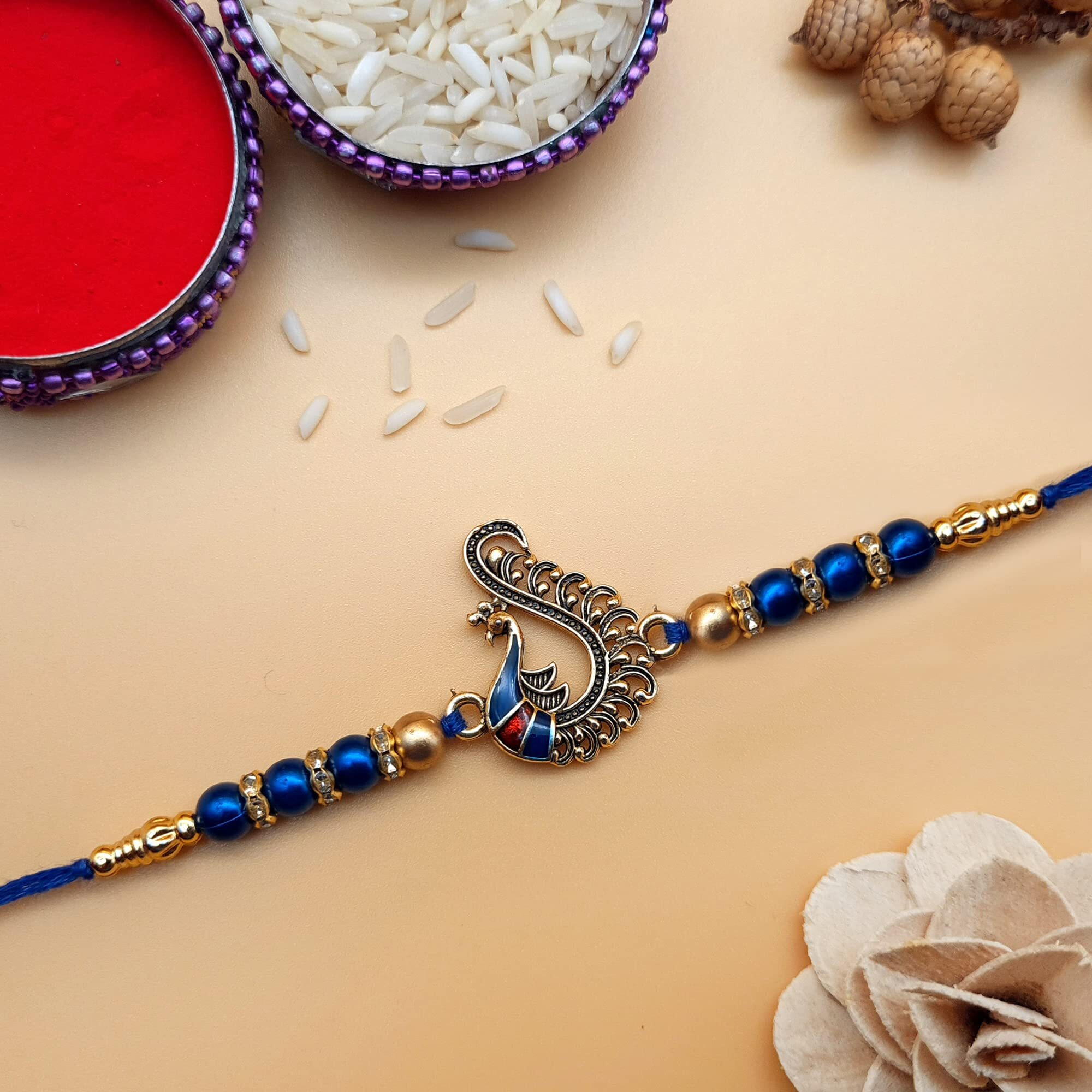 The Purple Tree Beautiful Handmade Peacock Rakhi With Card For Brother (Pack of 1, Blue, 1 Roli Chawal) Bhaiya rakhi, Rakhi For Brother, Peacock Rakhi, Rakhi Gift For Bhai