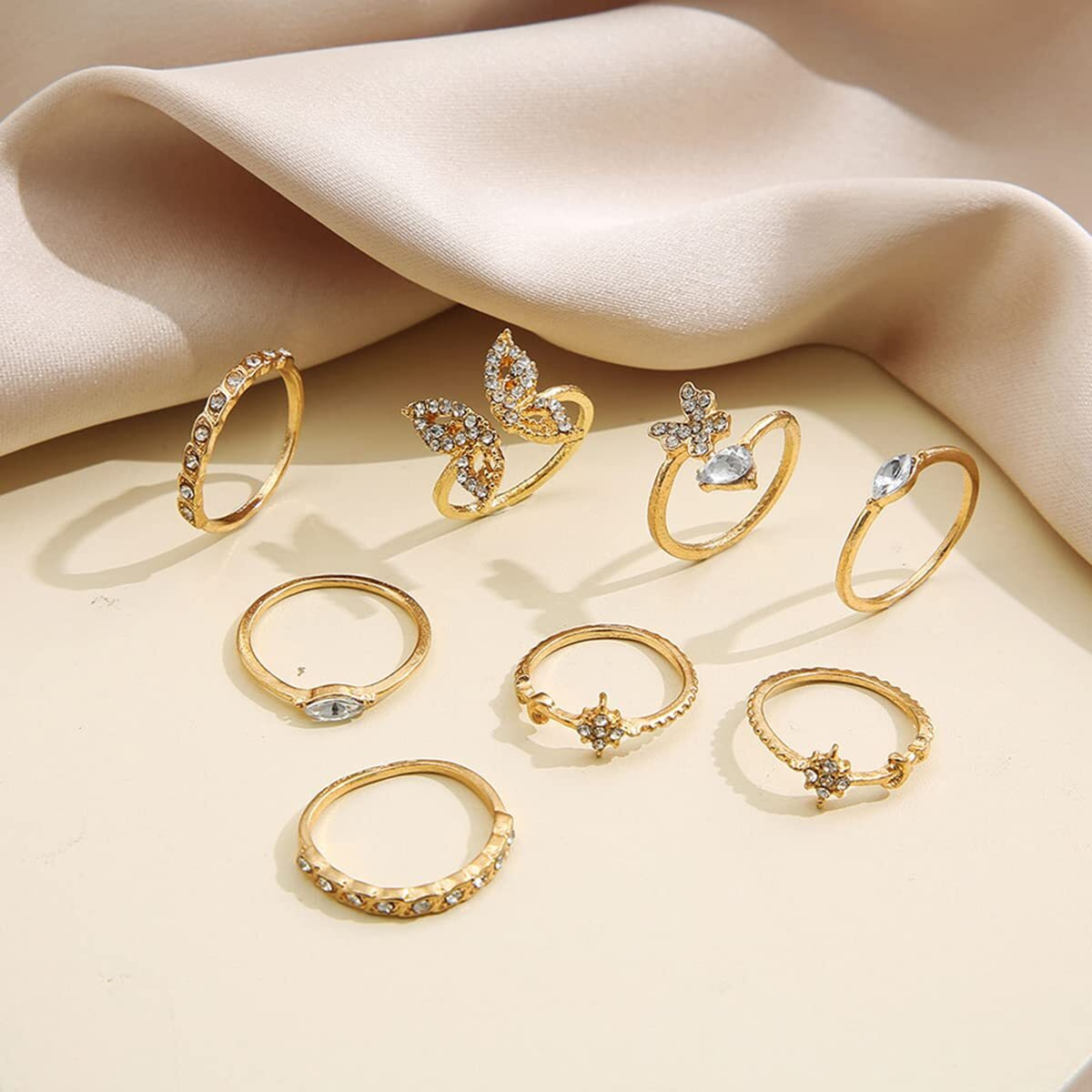Jewels Galaxy Jewellery For Women Gold Plated Contemporary Butterfly inspired Stackable Rings Set of 8 (JG-PC-RNGH-998)
