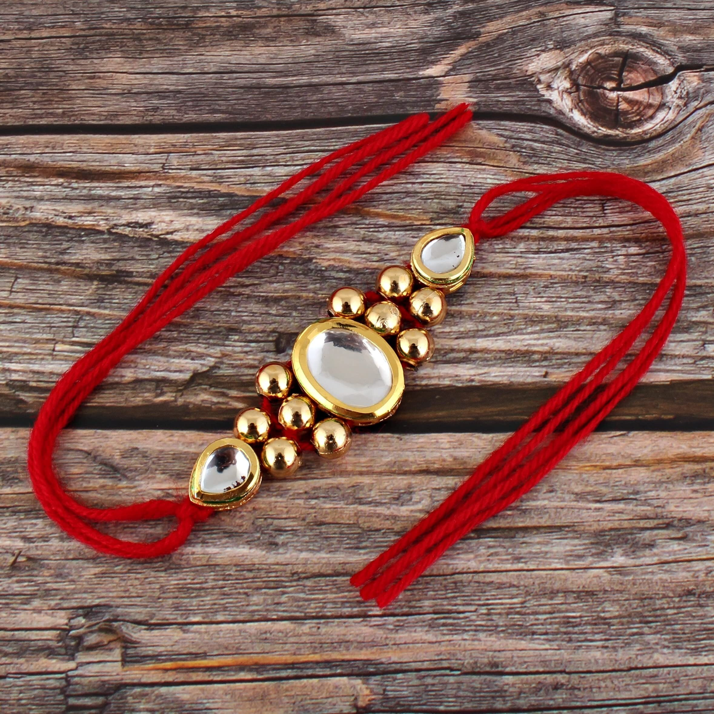 LUCKY JEWELLERY Designer Gold Plated Golden Color Oval Shape Rakhi for Bro/Brother/Bhaiya/Bhai/Bhabhi (Pack of 1) Rakshabandan Rakhee Bracelet Rakshashutra (100-J5R1-1690)