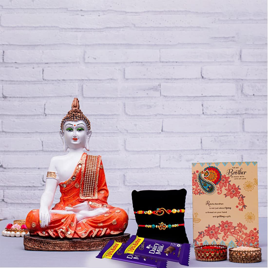 ARCHIES Wooden Om Rakhi for Brother Rakshabandhan Combo of 1 Rakhi, 1 Ganesh Laxmi Coin With 1 Roli & Chawal-10gm, 1 Exotic Assorted Chocolate(Butterscotch)-60gm & Greeting Card (Pack of 5)