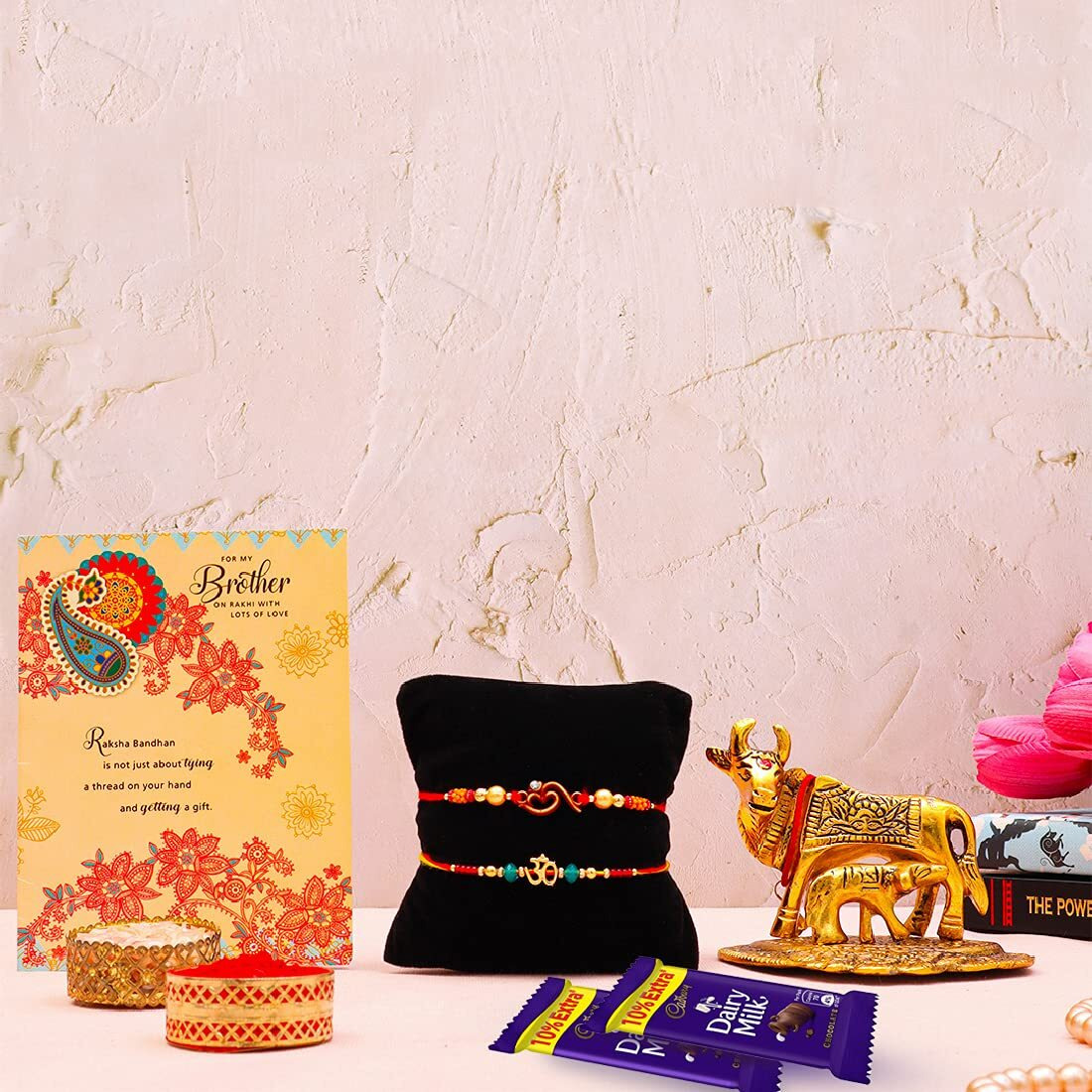 ARCHIES Multicolour Moti Rakhi for Brother Rakshabandhan Combo of 1 Rakhi, 1 Ganesh Laxmi Coin With 1 Roli & Chawal-10gm, 1 Exotic Assorted Chocolate(Dates and Almonds)60gm & Greeting Card (Pack of 5)