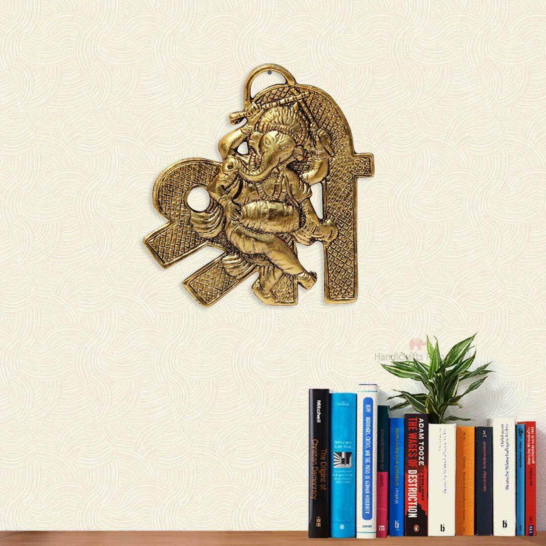 Handicrafts Paradise Ganesha Playing Dholak Placed On Shree Shaped Base Aluminium Metal Door Hanging (9.5 Cm X 0.25 Cm X 10.8 Cm)