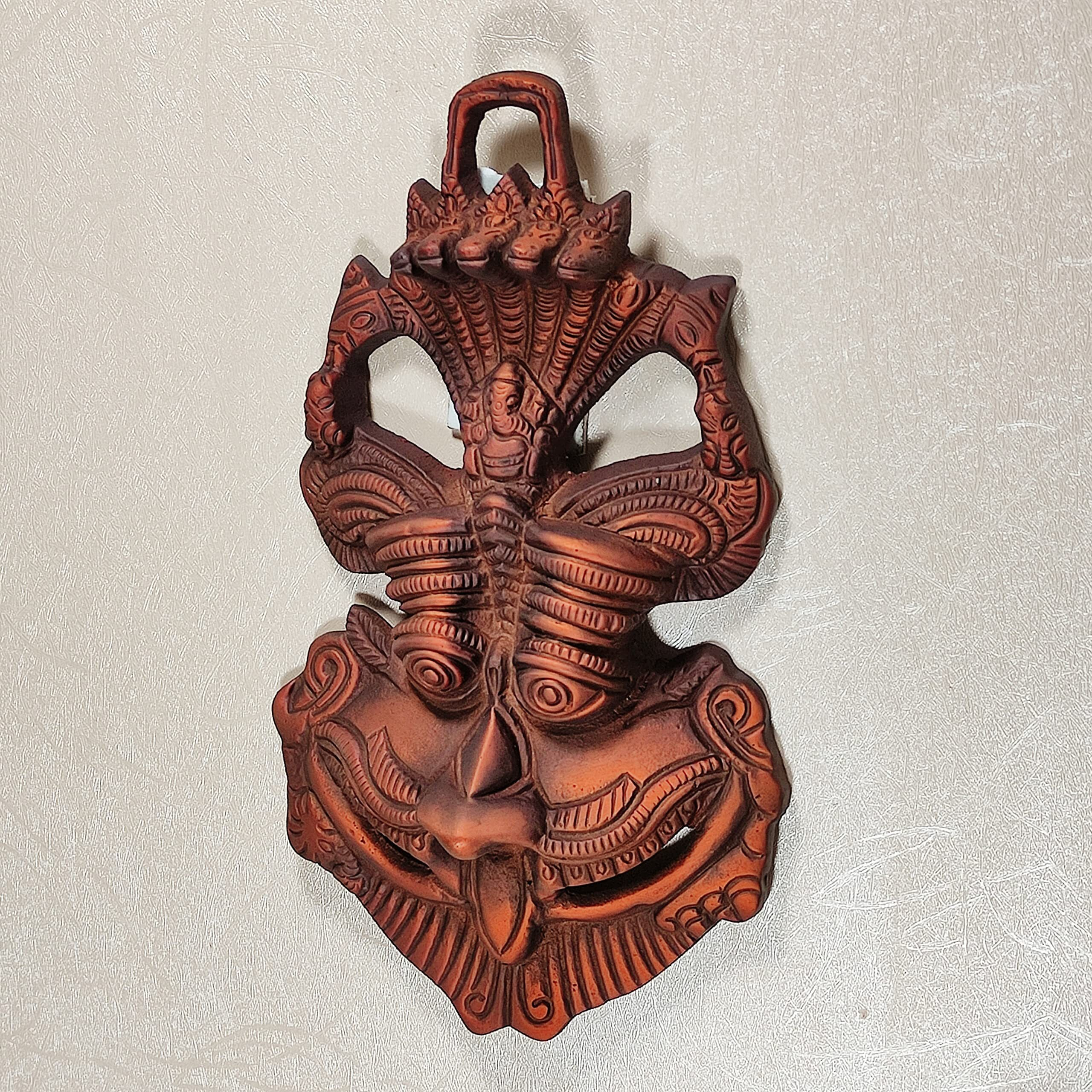 Dreamkraft Metal Face Mask Nazar Battu Evil Eye Protector Wall Mounted Nazar Suraksha Kawach Wall Hanging Evil Eye Hanging For Home & Office Entrance Copper -(16.5 X 3 X 9.5 Cm)