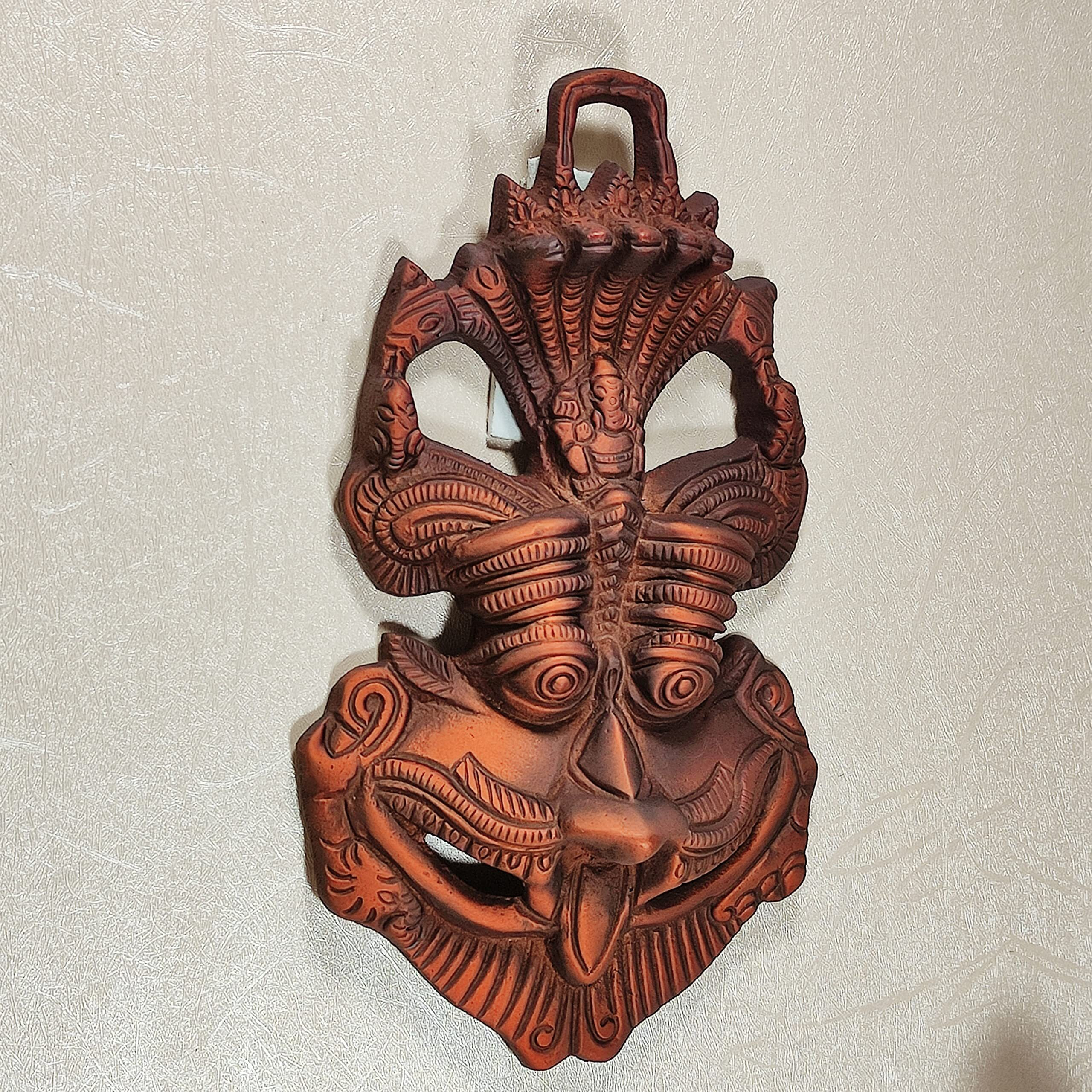 Dreamkraft Metal Face Mask Nazar Battu Evil Eye Protector Wall Mounted Nazar Suraksha Kawach Wall Hanging Evil Eye Hanging For Home & Office Entrance Copper -(16.5 X 3 X 9.5 Cm)