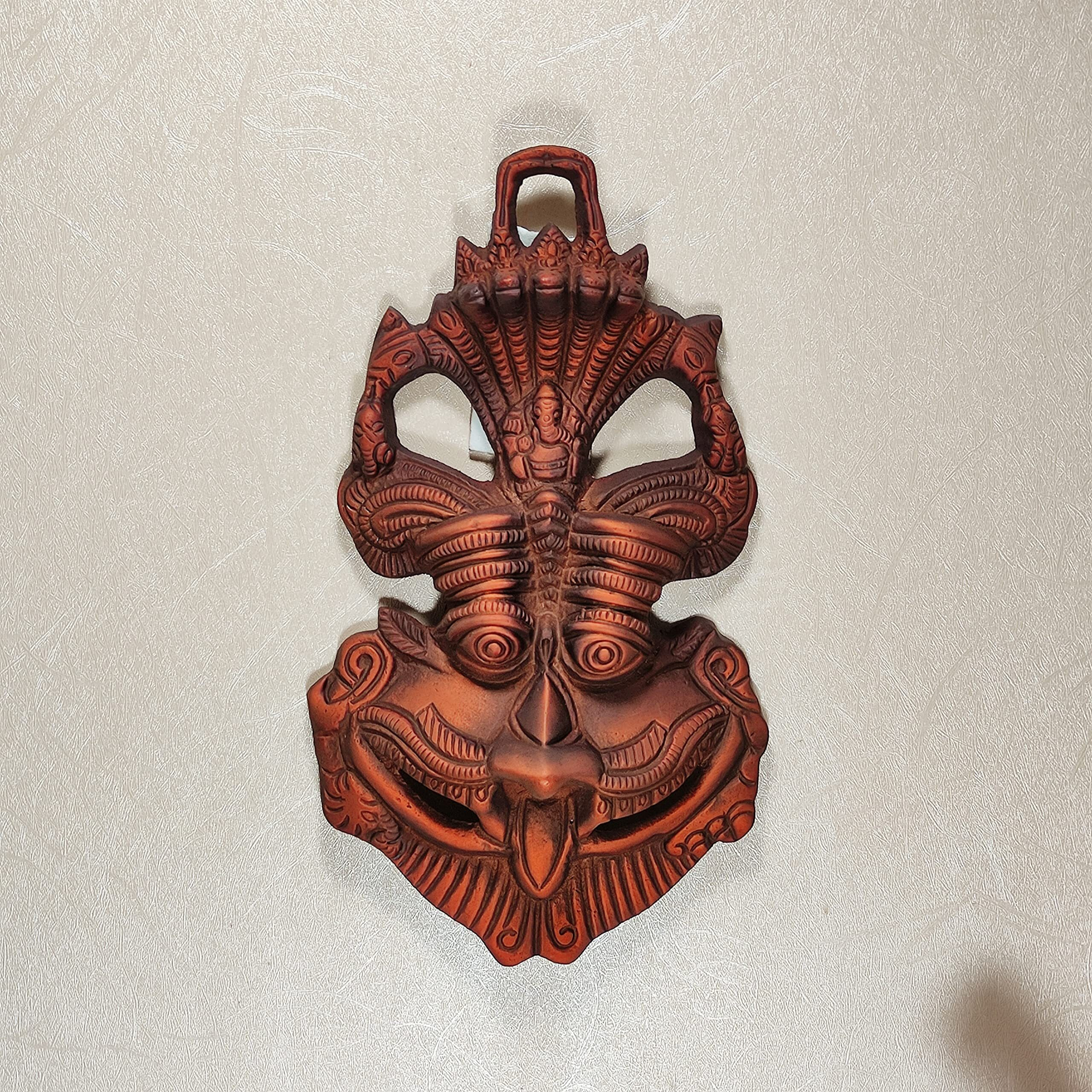 Dreamkraft Metal Face Mask Nazar Battu Evil Eye Protector Wall Mounted Nazar Suraksha Kawach Wall Hanging Evil Eye Hanging For Home & Office Entrance Copper -(16.5 X 3 X 9.5 Cm)