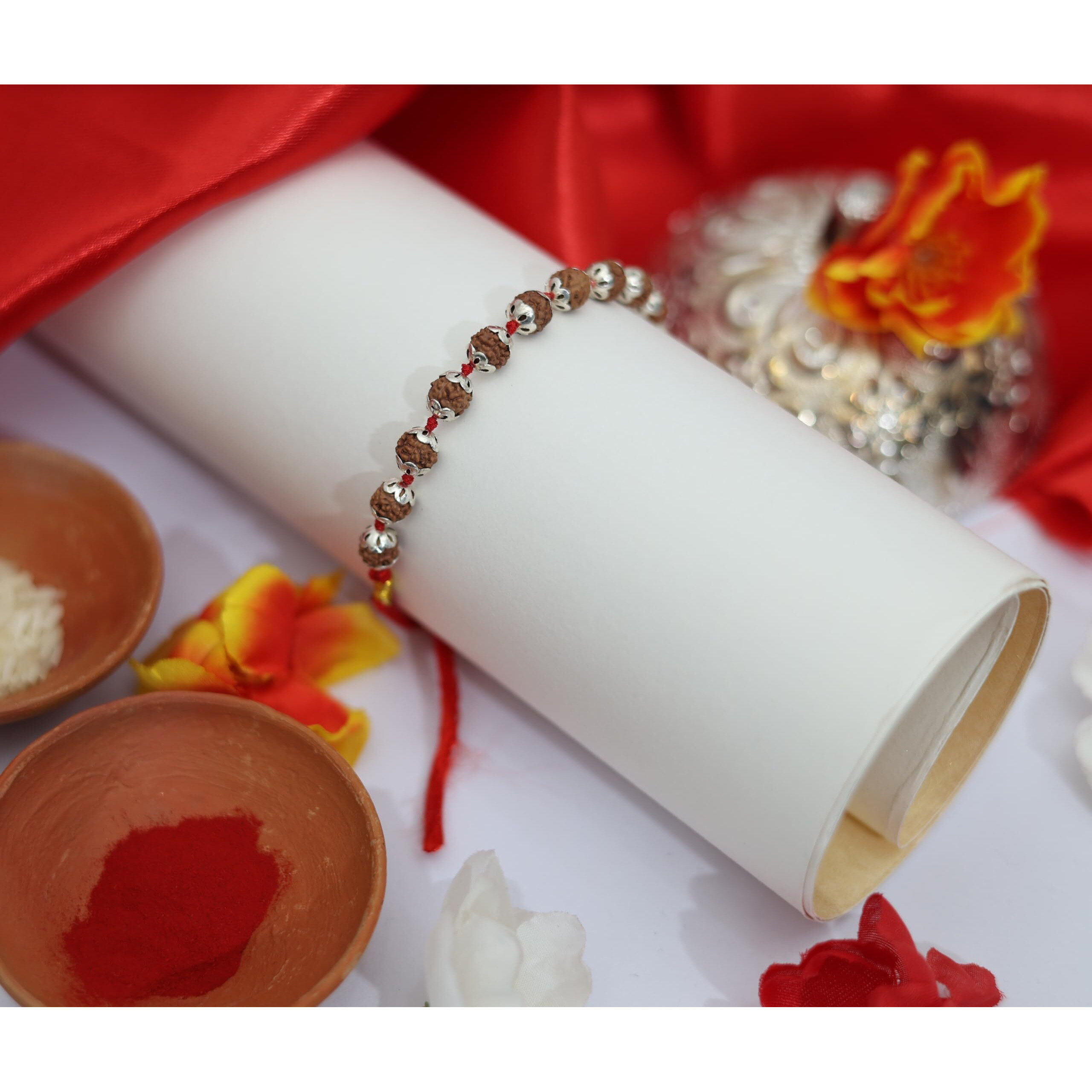 Shivaratna Rudraksha Rakhi With Silver Capping - (Roli, Chawal) Natural Color Rudraksha