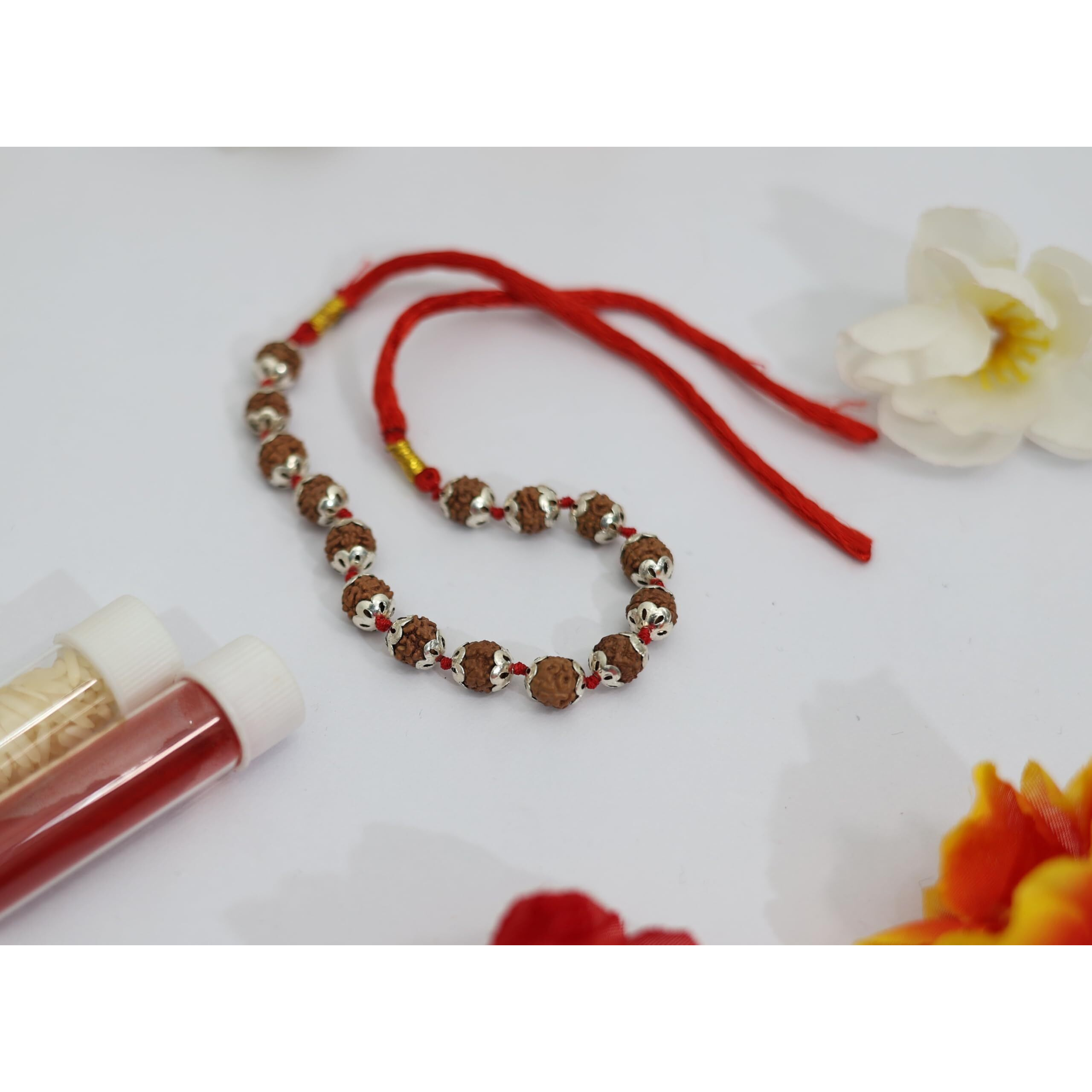 Shivaratna Rudraksha Rakhi With Silver Capping - (Roli, Chawal) Natural Color Rudraksha