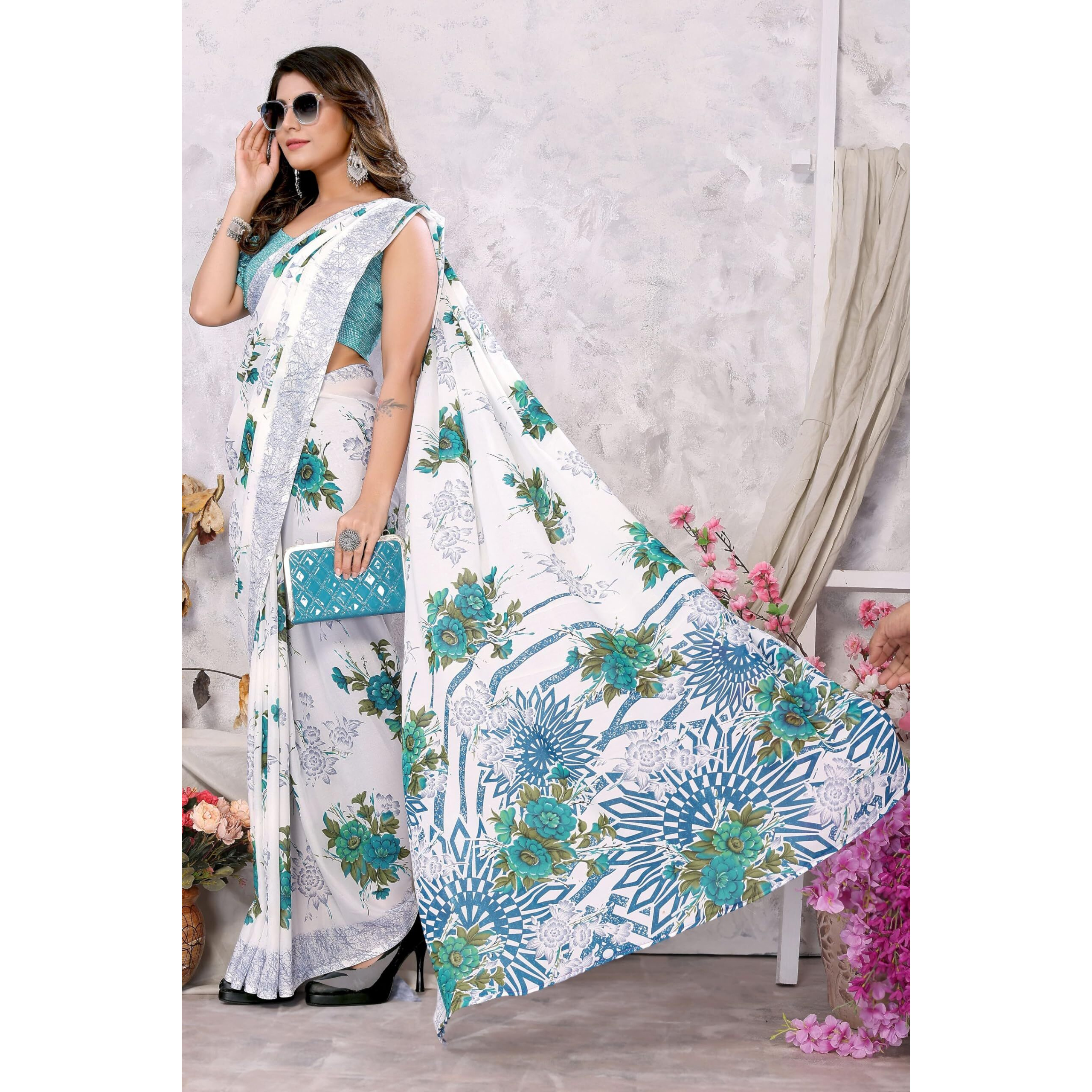 Yashika Womens Trendy Printed Georgette Sky Blue Color Saree with Blouse Material(NUTAN SKY BLUE)