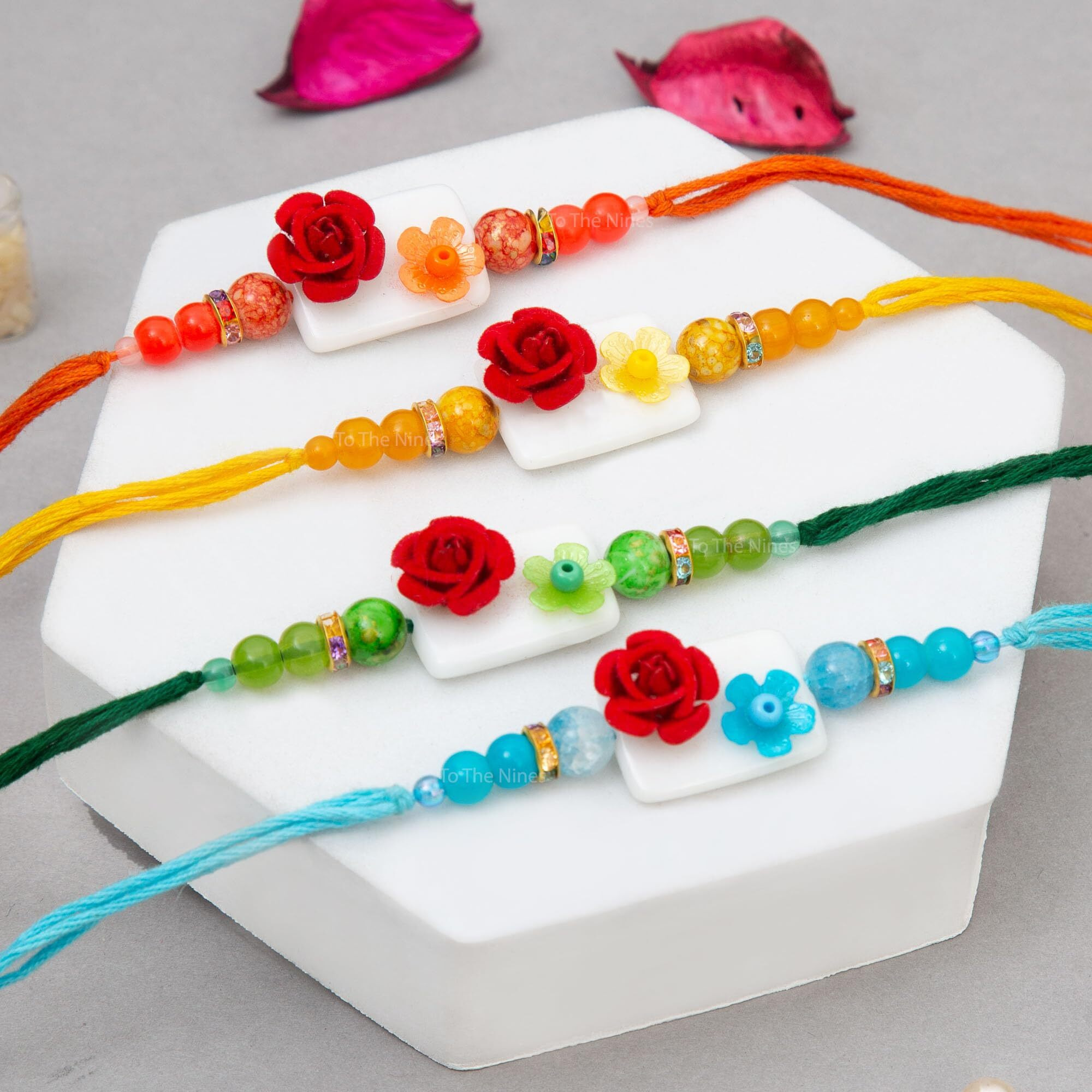 To The Nines Elegant Golden Rakhi/Band for Beloved Brother (Rakhi/Band Combo OF 4) (Multi12)