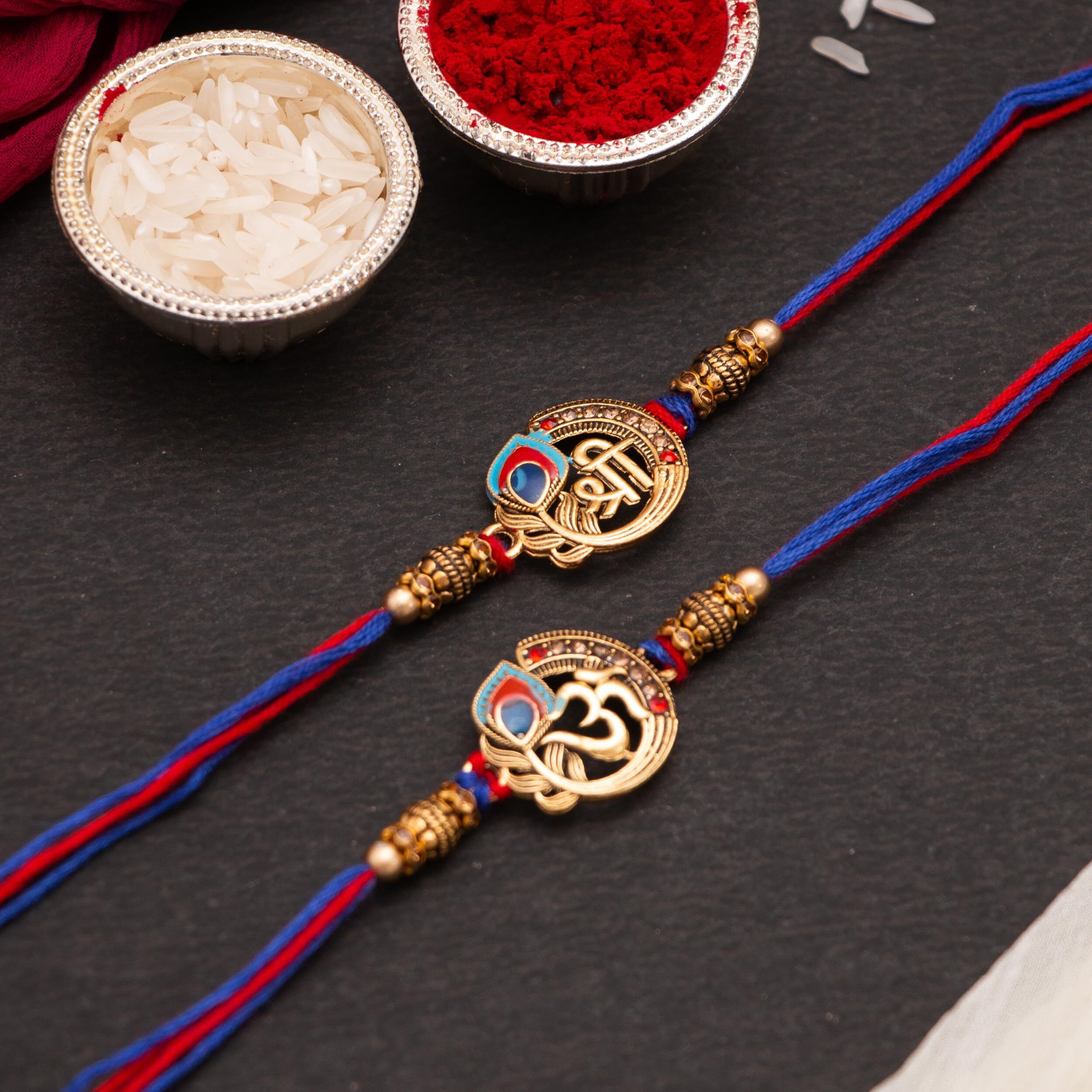 CraftVatika Metal Designer Rakhi For Brother Bhaiya Om Rakhi For Bhai With Greeting Card Shri Mor Pankh Rakhi For Bhaiya Rakhi Set Of 2 For Rakshabandhan Combo