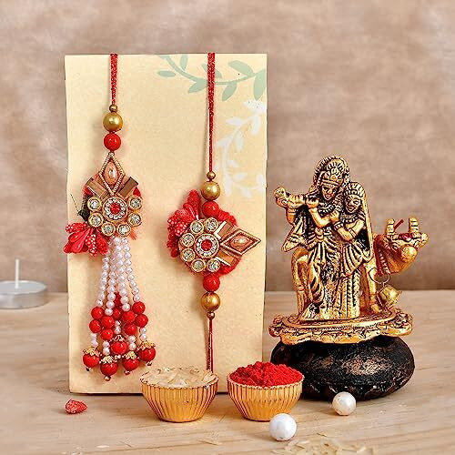 CraftVatika Rakhi Set of 2 for Bhaiya Bhabhi with Radha Krishna Idol Gift Rakhi for Brother and Bhabhi Couple Rakhi-Combo of 5 ( 1 Krishna idol, 1 Bhai Rakhi, 1 Lumba rakhi , Roli tikka, Greeting card