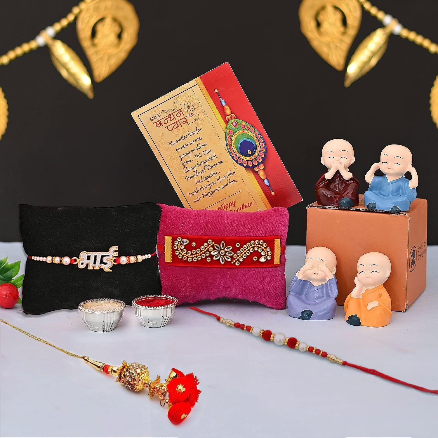 CraftVatika Rakhi for Bhaiya Combo Set - Rakhi for Bhai Bhabhi Kids - Rakhis for Rakshabandhan Hamper - Miniature Buddha Monk Figurines Showpiece with Dora, Bhai, Lumba Valvet Rakhi, Greeting Card