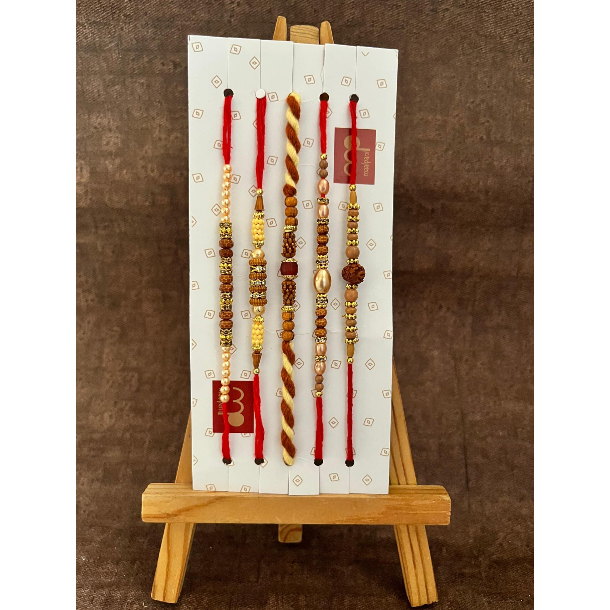 Maalpani Rakhi Gift Hamper | 2 Kitkat Chocolate + 5 Rakhis Set With Roli Chawal | Rakhi for Brother (Gift Hamper Set for Festival)