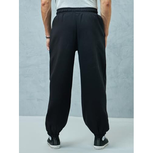 Bewakoof Men's Solid Super Loose Fit Cotton Blend Joggers_ 617465 Black L
