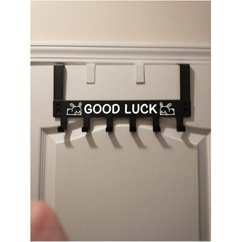 Misamo Enterprise Over Door Hook Rack With 'Good Luck' Design, 6 Hooks, Black Metal Hanger For Clothes, Towels And Accessories, No-Drill Installation (Set Of 1)