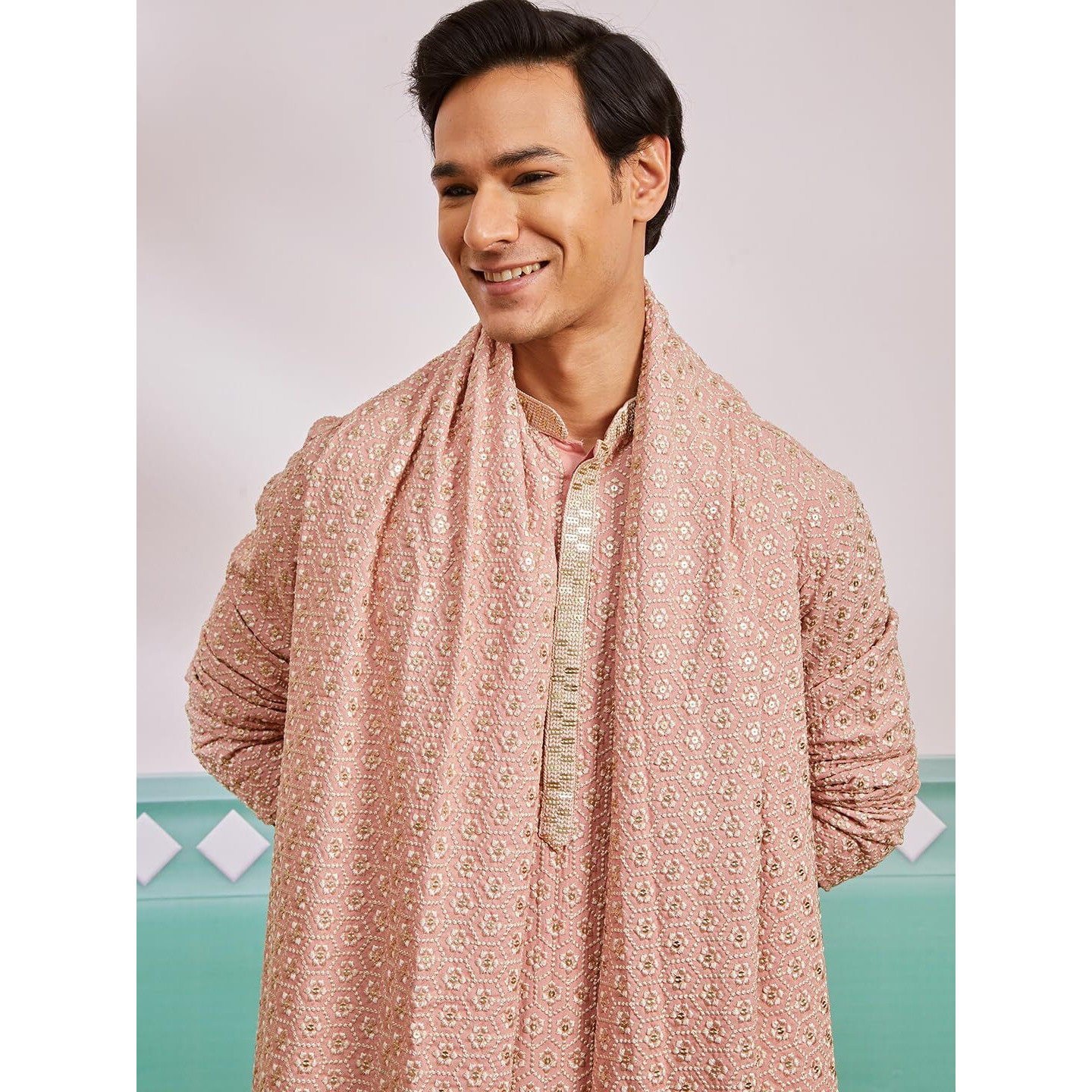 VASTRAMAY Men's Peach Rayon Kurta, Pyjama And Dupatta Set. - This men's kurta, pant, and dupatta set exudes elegance with its intricate design and sophisticated color palette.
