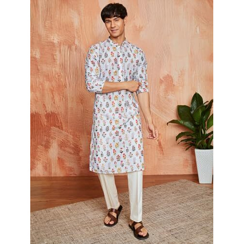 VASTRAMAY Men's Aqua Silk Blend Kurta And Pyjama Set - This men's printed kurta showcases a floral print with Sequined,with a pant set, creating a bold and stylish look.