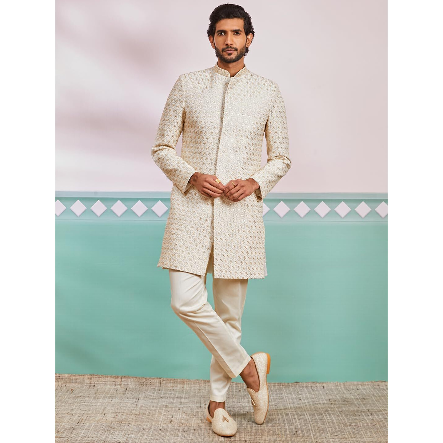 VASTRAMAY Men's Off White Rayon Indo Western And Pyjama Set - This men's embroidered Indo-Western, pant set is a perfect fusion of tradition and modern elegance.