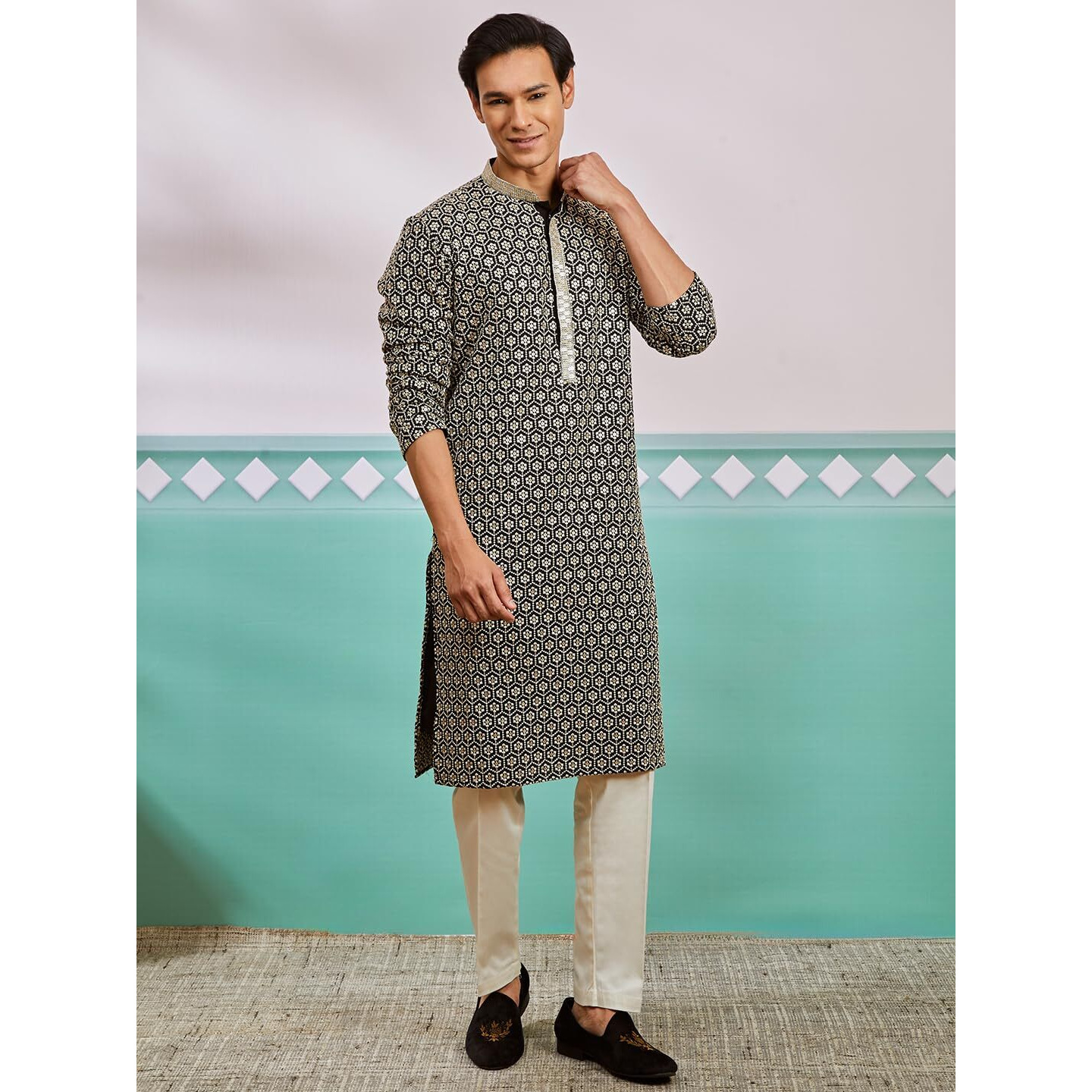 VASTRAMAY Men's Black Rayon Kurta And Pyjama Set - This men's kurta, pant set exudes elegance with its intricate design and sophisticated color palette.