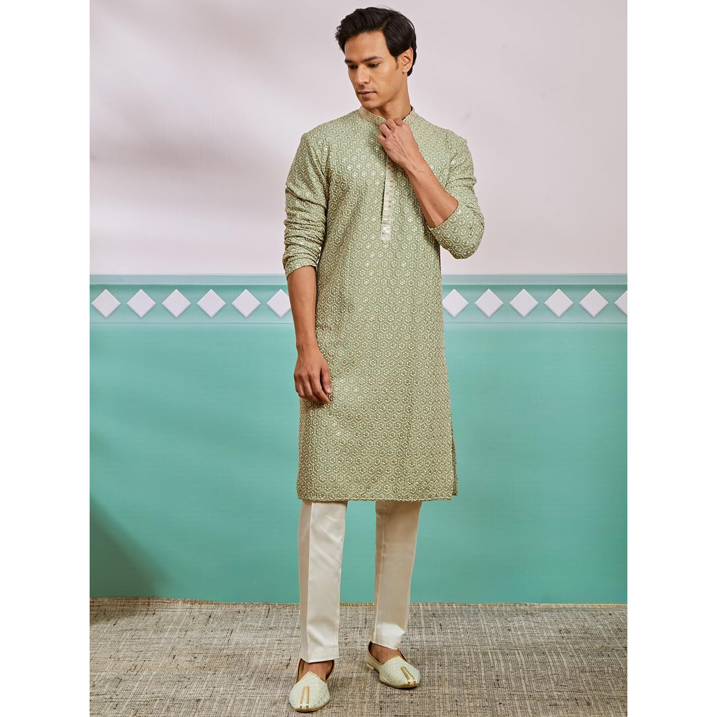 VASTRAMAY Men's Pista Green Rayon Kurta And Pyjama Set - This men's kurta, pant set exudes elegance with its intricate design and sophisticated color palette.