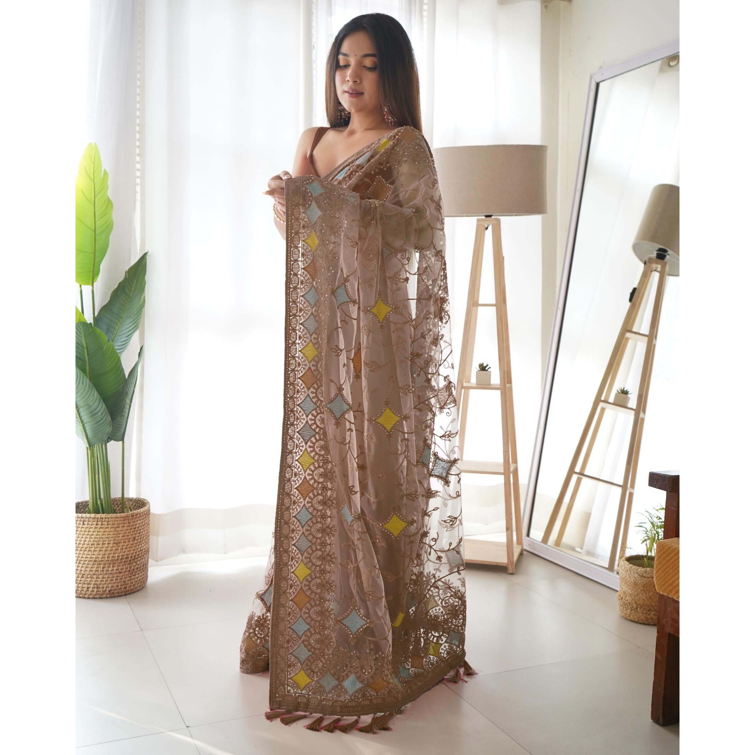 SAREE MALL Womens Net Embroidered Embellished Saree With Unstitched Blouse Piece(Brown_AAVYA702_SM)