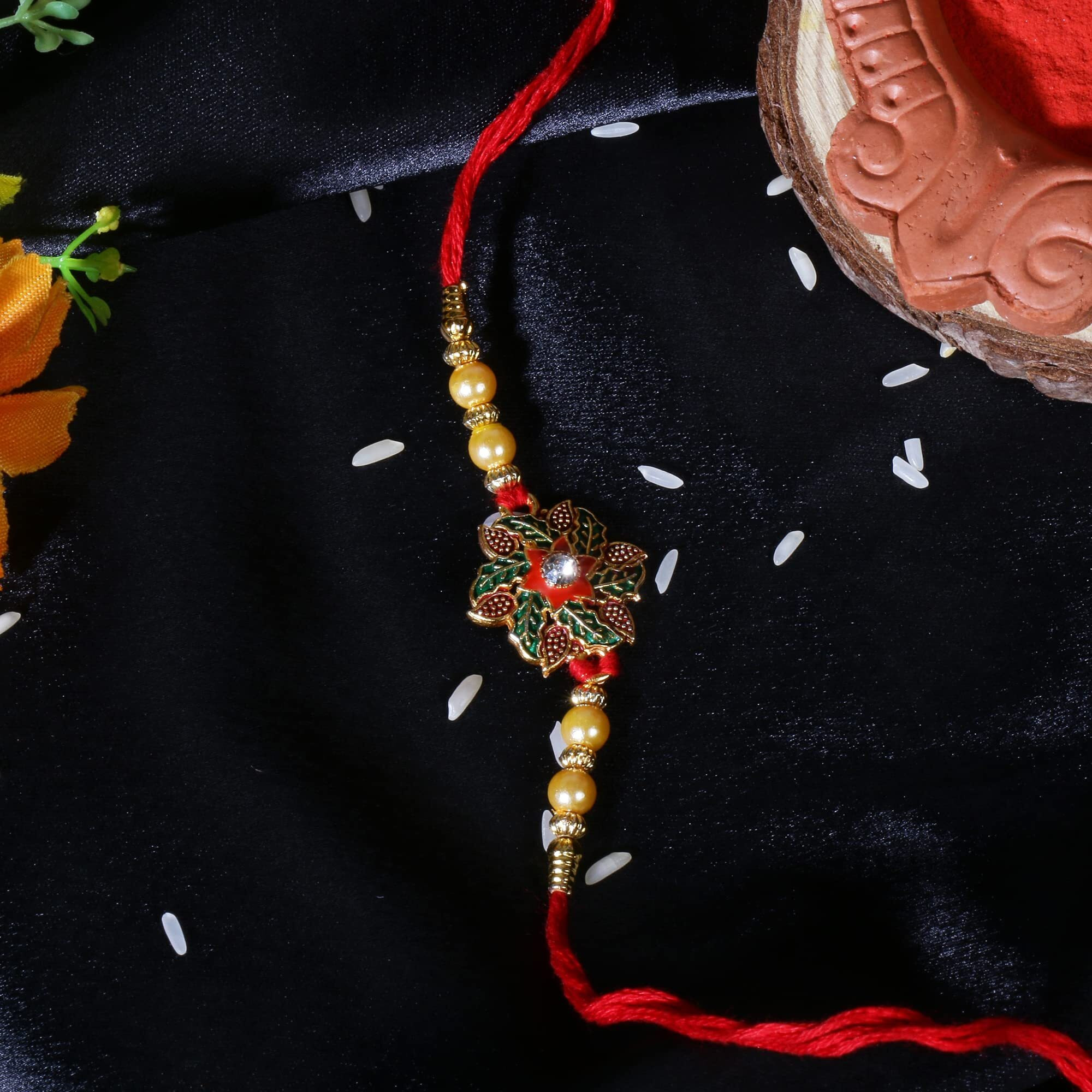 Riddhika Ventures Set of Multi Colour Family Rakhi with Roli Chawal and Greeting Card (K17E1G1M1P15)