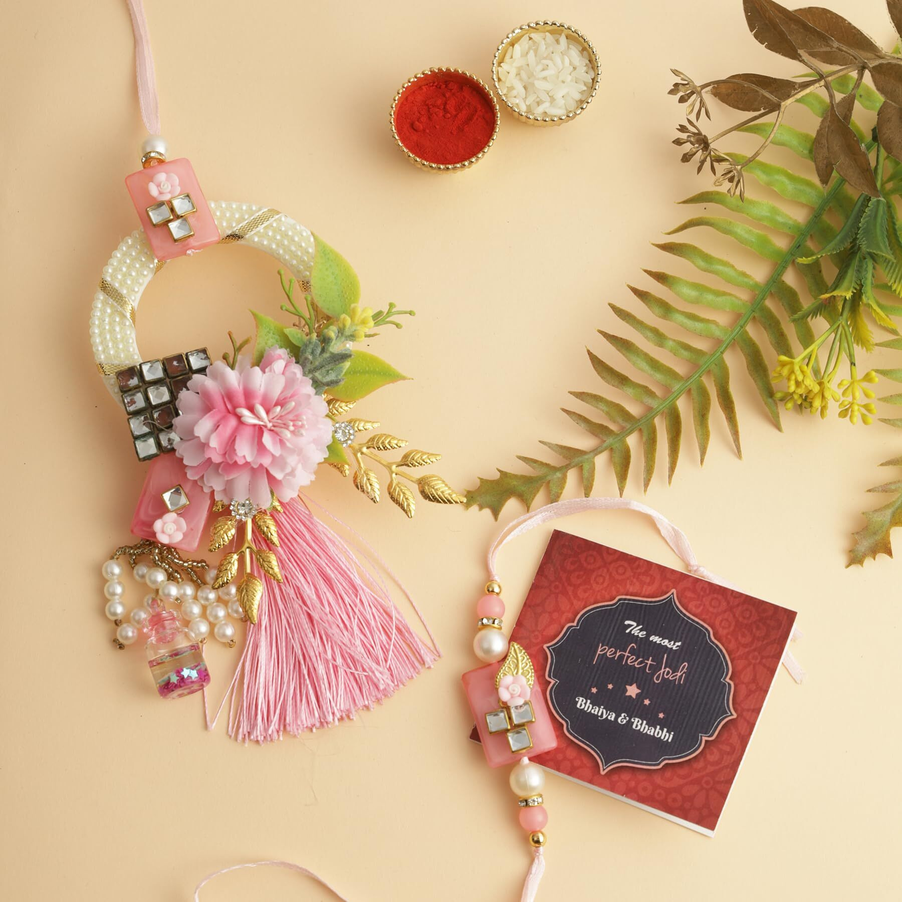 TIED RIBBONS Rakhi for Brother and Bhabhi Combo - Designer Floral Couple Rakhi Set of 2 with Greeting Card and Tikka - Hanging Lumba Rakhi for Bhaiya Bhabhi - Rakhi for Rakshabandhan