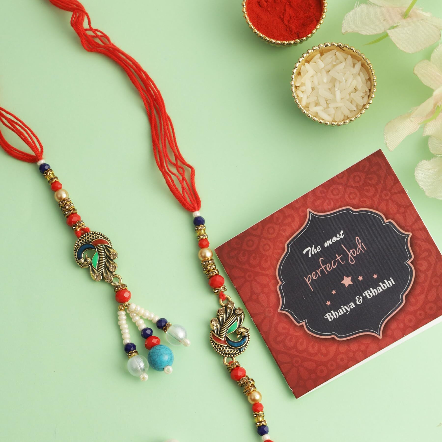 TIED RIBBONS Rakhi for Brother and Bhabhi - Handmade Peacock Couple Rakhi Set of 2 with Greeting Card and Tikka - Lumba Rakhi for Bhaiya Bhabhi - Rakhi for Rakshabandhan (Design 3)
