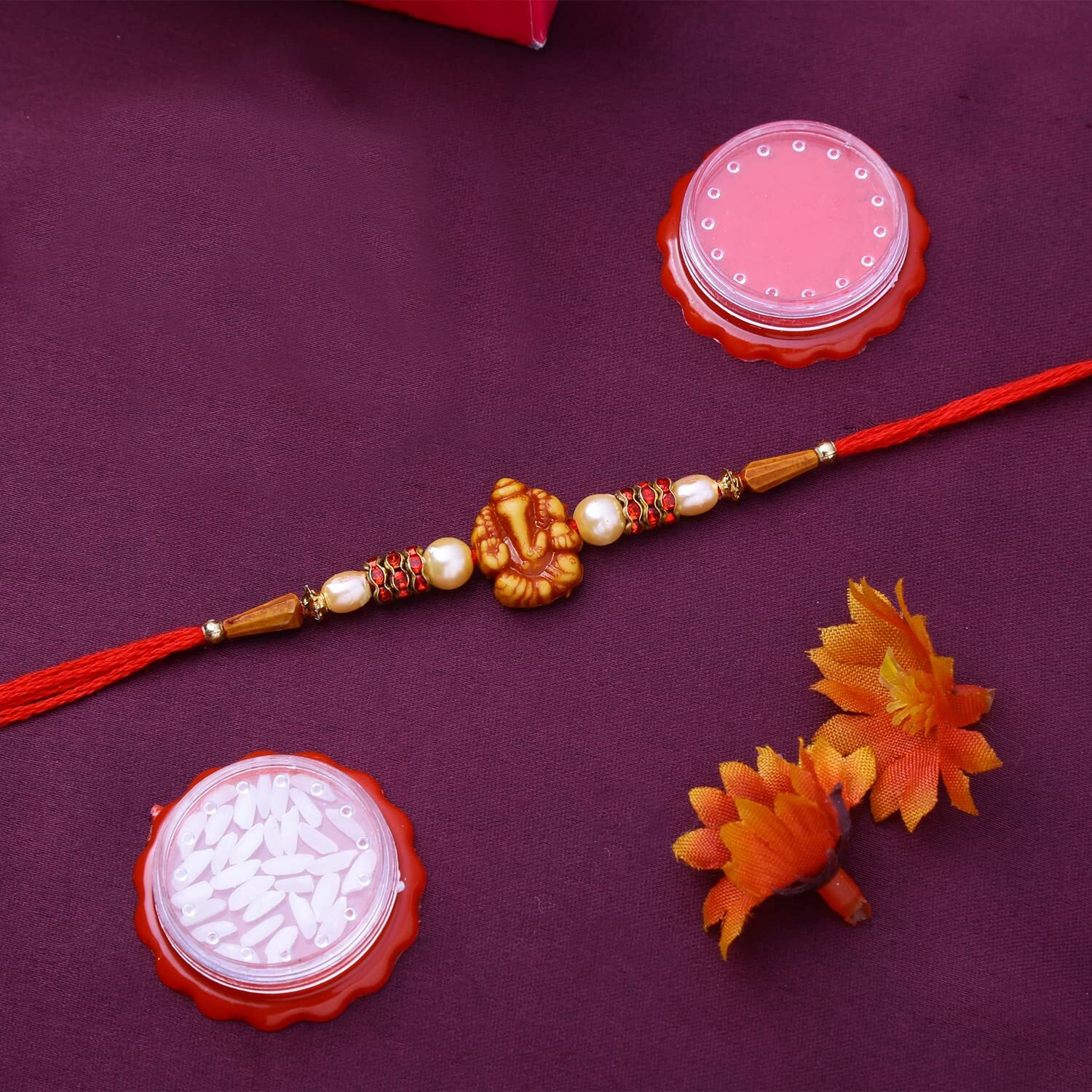 Riddhika Ventures Religious and Designer Pearl Rakhi with Roli Chawal and Greeting Card (I1F1H1H1)